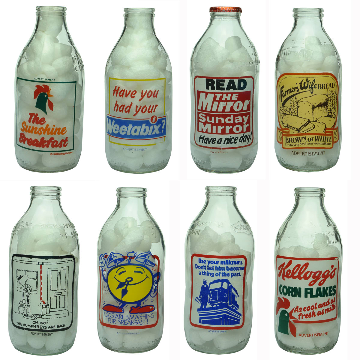 8 Ceramic Label Advertising Milks: Kelloggs Corn Flakes; Weetabix; The Mirror; Farmer's Wife Bread; Milkman Comic; Eggs; British Milk; Kelloggs. (UK)