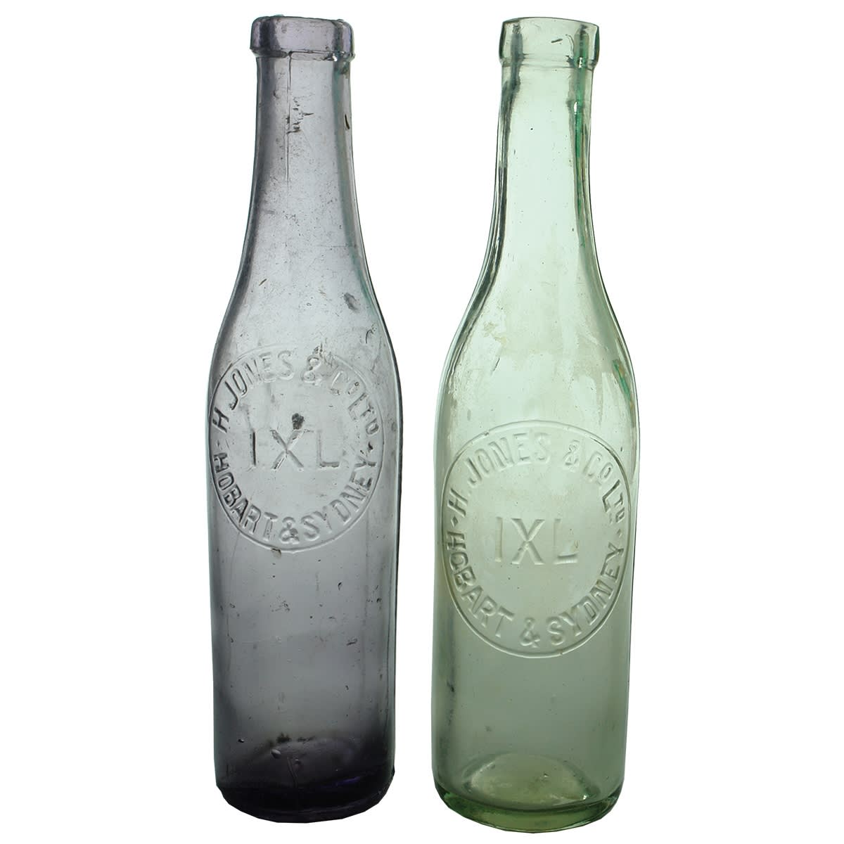Sauces. Both H. Jones & Co Ltd, Hobart & Sydney, IXL. 1. 13 ounce machine made, amethyst, small badge to shoulder (62 mm diameter). 2. 13 ounce applied top, spun finish example, clear, large badge to mid body (70 mm diameter). (Tasmania, New South Wales)