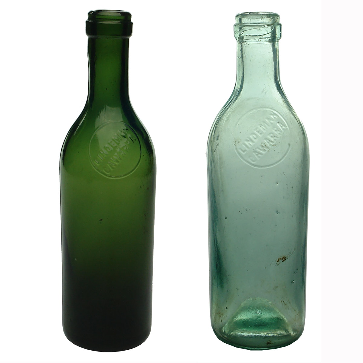 2 Wines: Both Lindeman Cawarra embossed in circles on the shoulder. Dark Green & Aqua. 4 oz. (New South Wales)