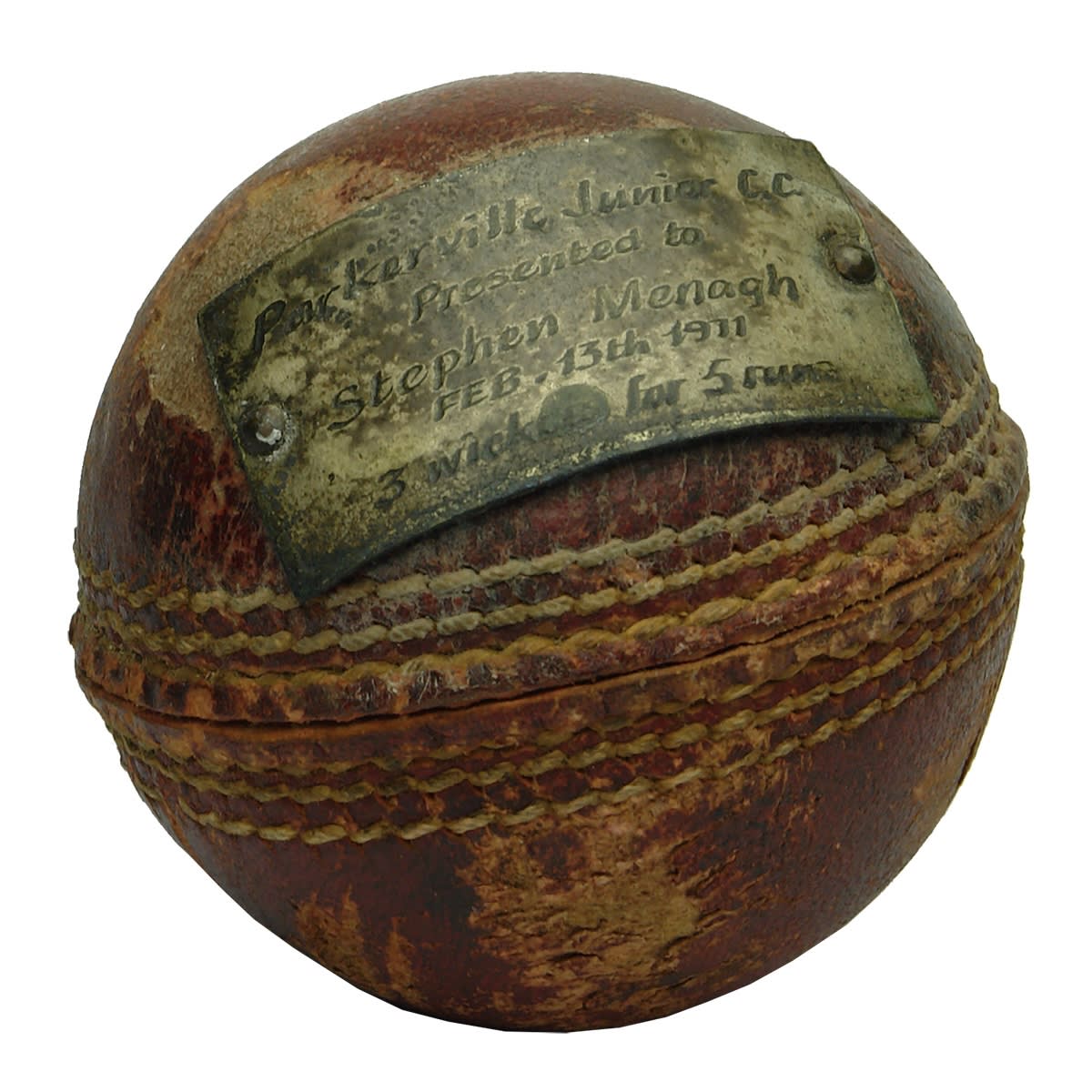 Sporting. Cricket ball with badge: Parkerville Junior C. C., Presented to Stephen Menagh, Feb. 13th 1911, 3 wickets for 5 runs. (Western Australia)