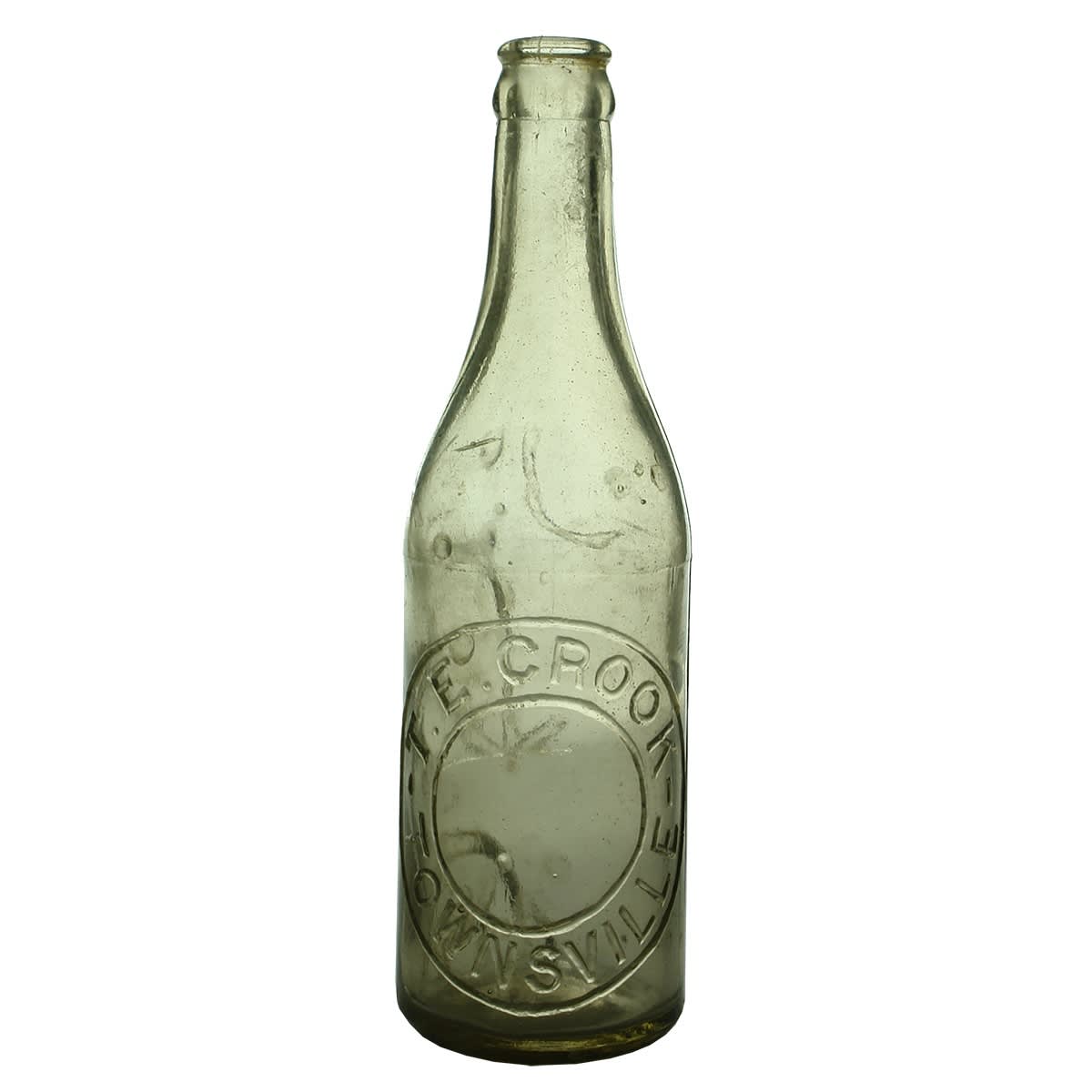 Crown Seal. T. E. Crook, Townsville. Offset seam. Heavy embossing. Clear. 10 oz. (Queensland)