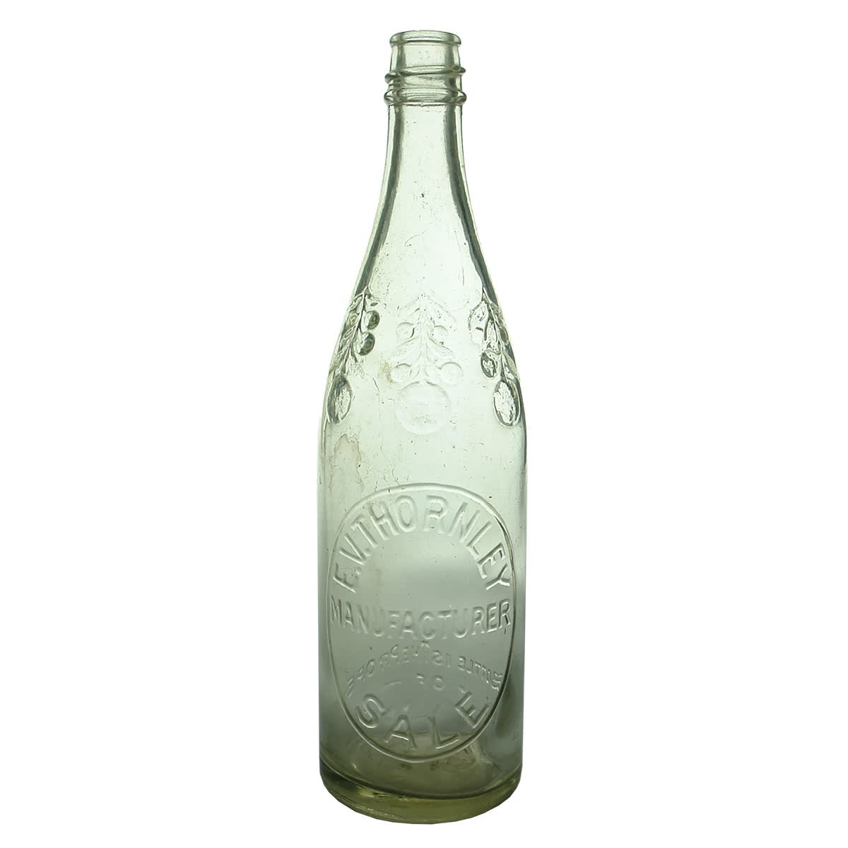Cordial. E. V. Thornley, Sale. Fruit around shoulder. Screw top. Clear. 26 oz. (Gippsland, Victoria)