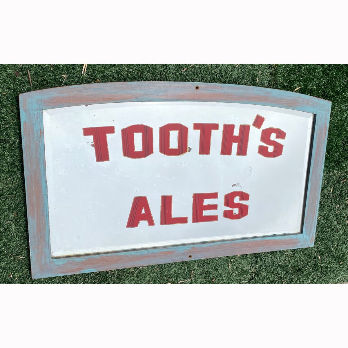 Beer Advertising Mirror. Tooth's Ales. Mirror has a curved top. (Tooth & Co Ltd., Sydney, New South Wales)