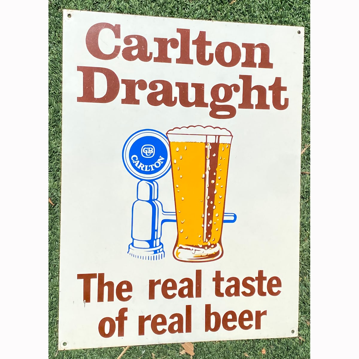 Printed Tin Sign. Carlton Draught. The real taste of real beer. Carlton & United Breweries, Melbourne. (Not for post. Arrangements will have to be made by winning bidder for pickup or courier delivery)  (Victoria)