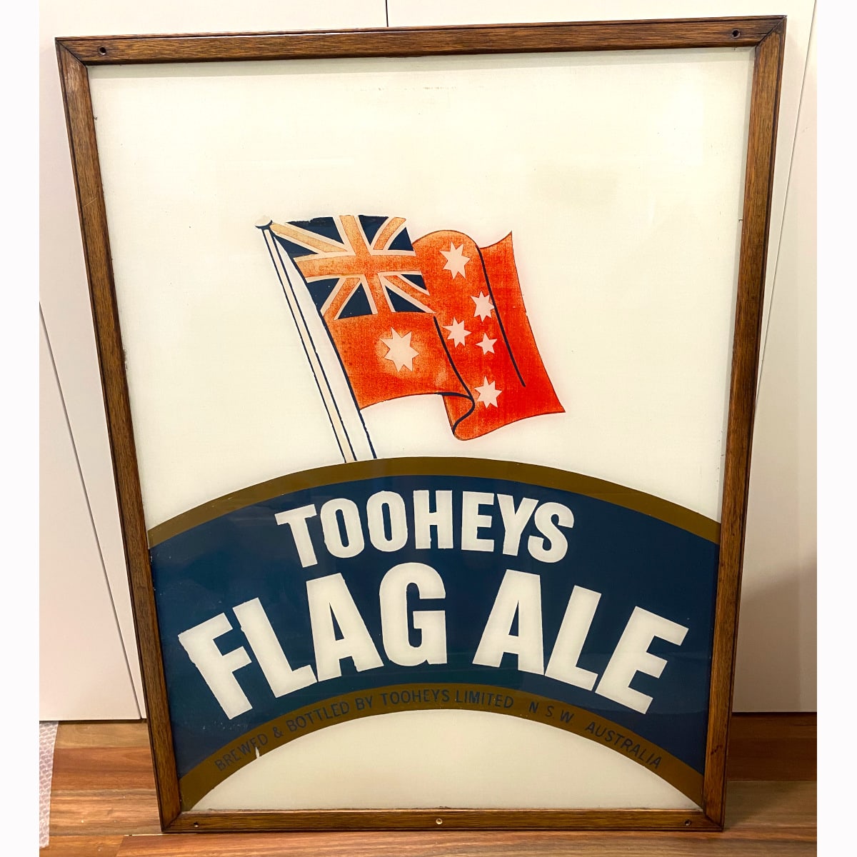 Large Painted Glass Sign. Tooheys Flag Ale with Red Australian Flag. Tooheys Ltd Australia. (Not for post. Arrangements will have to be made by winning bidder for pickup or courier delivery)  (New South Wales)