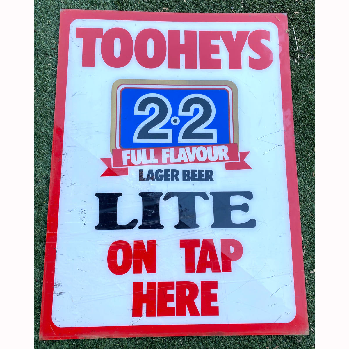 Large Perspex Advertising Sign Unframed. Tooheys 2.2 Full Flavour Lager Beer. Lite. On Tap here. (Not for post. Arrangements will have to be made by winning bidder for pickup or courier delivery)  (New South Wales)