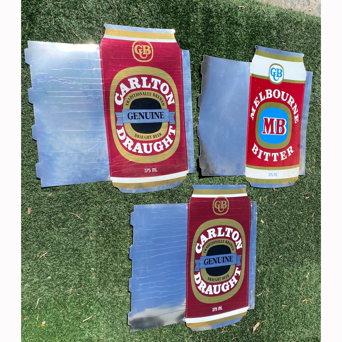 3 Very large display fold up cardboard "Cans". 2 x Carlton Draught, 1 x Melbourne Bitter. (Not for post. Arrangements will have to be made by winning bidder for pickup or courier delivery)  (Carlton & United Breweries, Victoria)