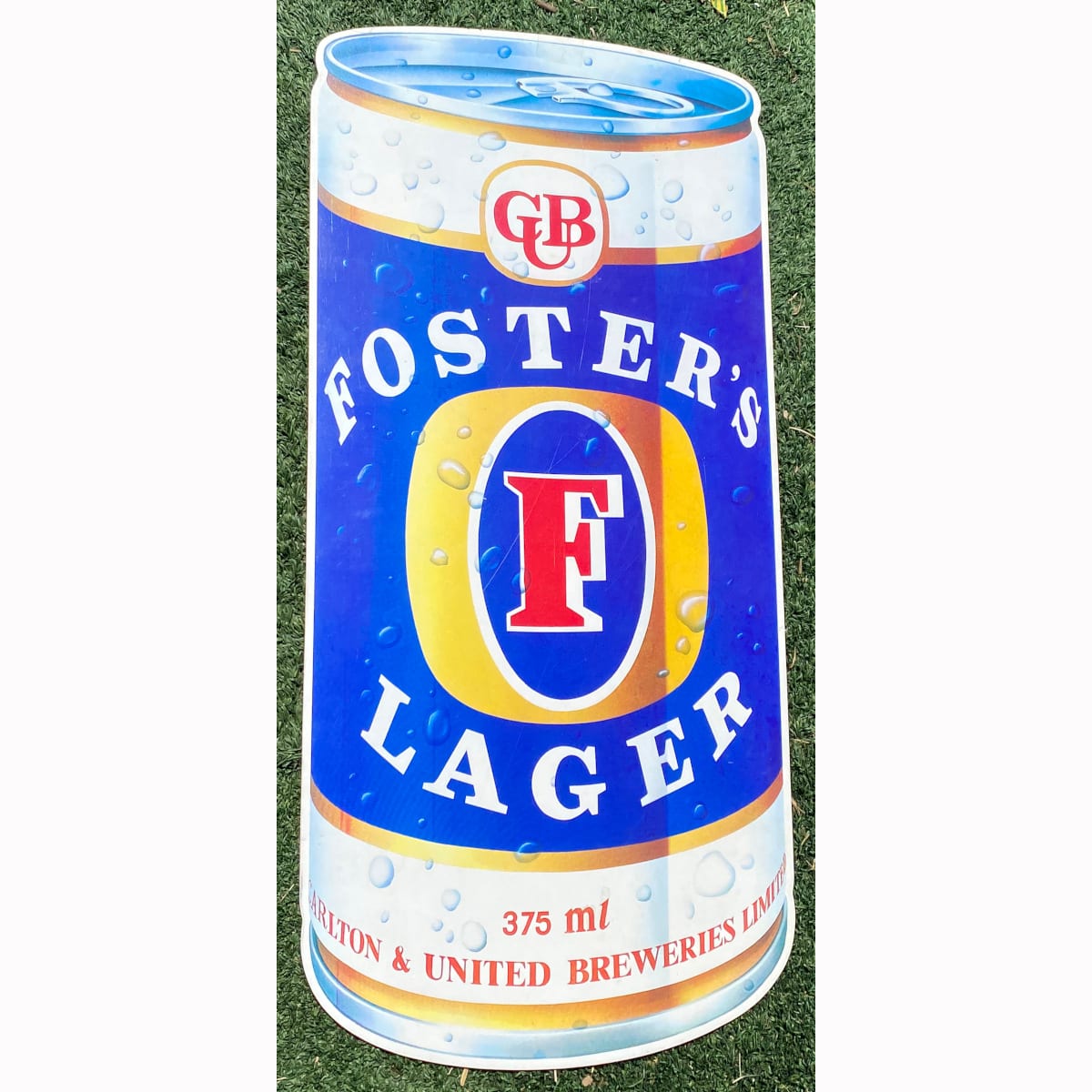 Large Coated Cardboard Sign. Foster's Lager Beer Can cut out. Carlton & United Breweries. (Not for post. Arrangements will have to be made by winning bidder for pickup or courier delivery) (Victoria)