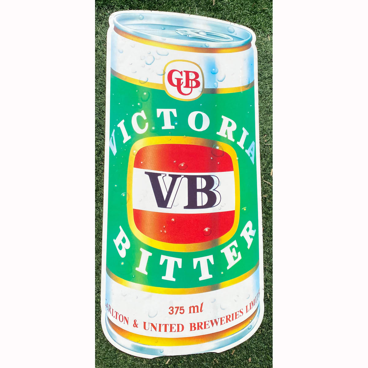 Large Coated Cardboard Sign. Victoria Bitter Beer Can cut out. Carlton & United Breweries. (Not for post. Arrangements will have to be made by winning bidder for pickup or courier delivery)  (Victoria)