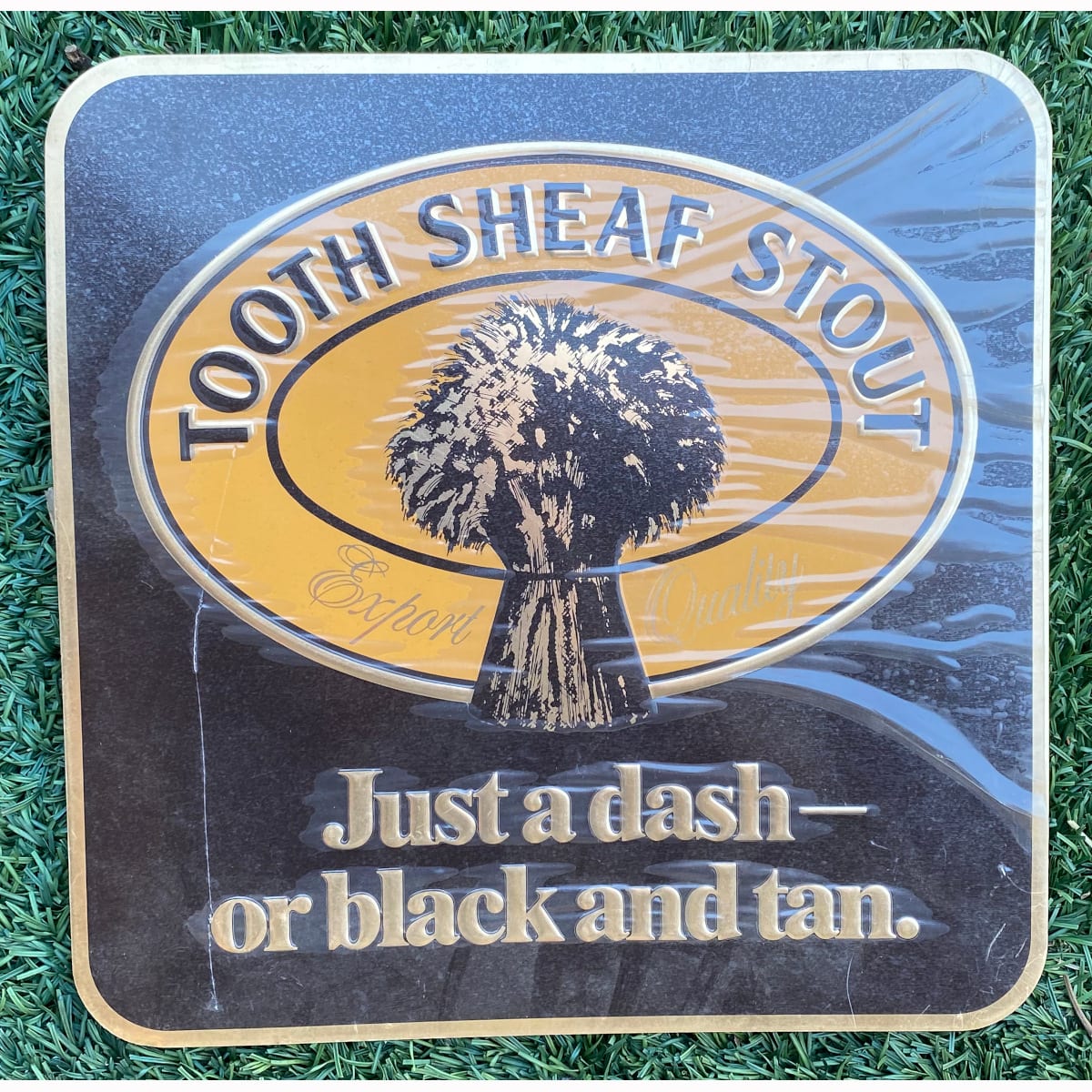 Small embossed & printed sign with adhesive backing. Tooth Sheaf Stout. Just a dash - of black and tan. (Sydney, New South Wales)