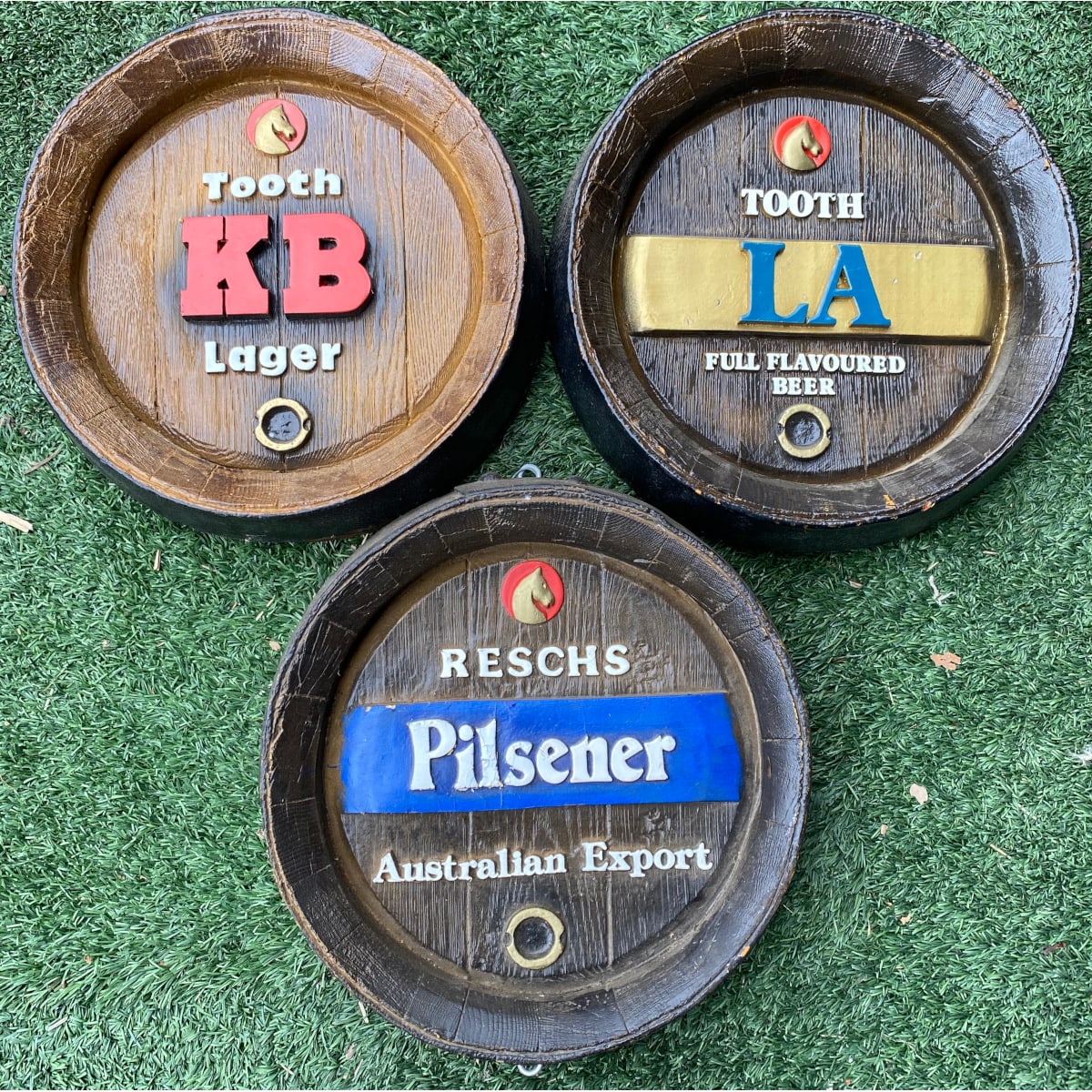 3 Plastic "Barrel Ends" with advertising for: Resch's Pilsener; Tooth KB Lager; Tooth LA. (Sydney, New South Wales)