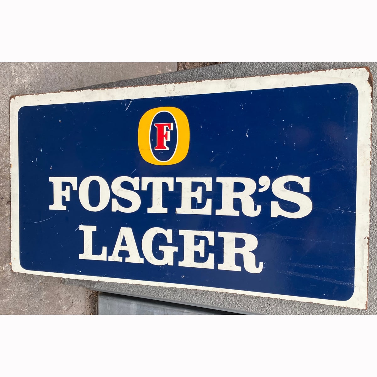 Small painted Masonite Sign. Fosters Lager. CUB. Carlton & United Breweries. (Not for post. Arrangements will have to be made by winning bidder for pickup or courier delivery)  (Victoria)