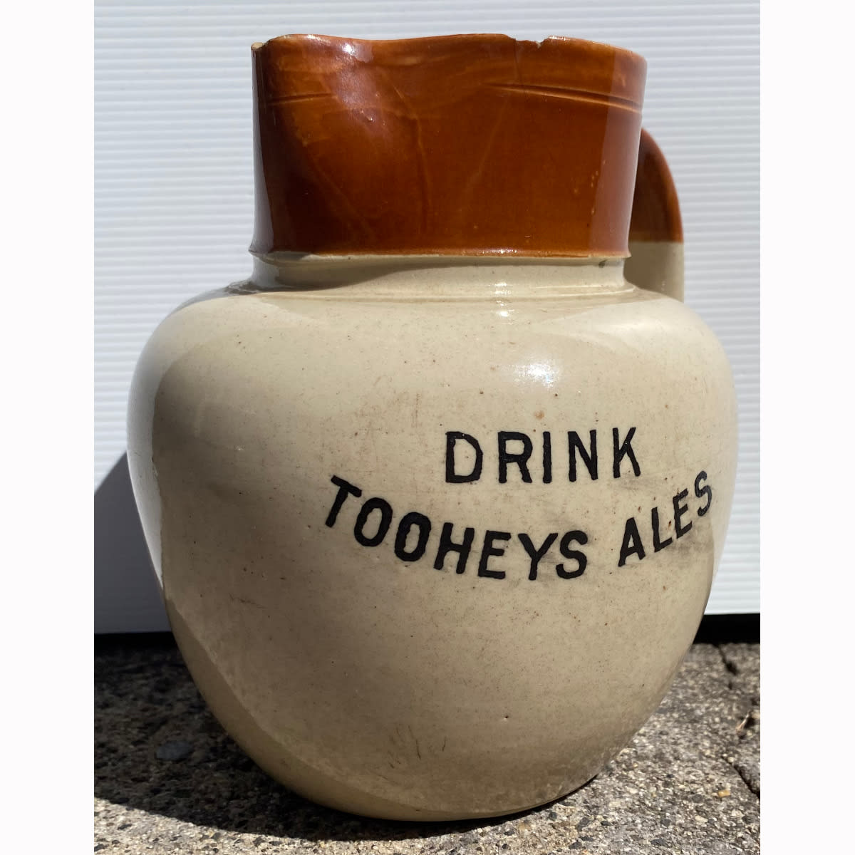 Advertising Water Jug. Drink Tooheys Ales. Orange Tan top. (Sydney, New South Wales)