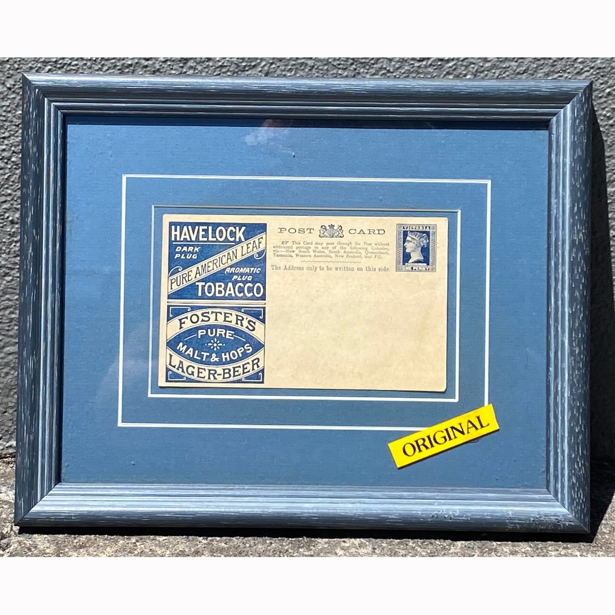 Framed original Postcard. Victoria One Penny. Havelock Tobacco & Foster's Lager Beer advertising.