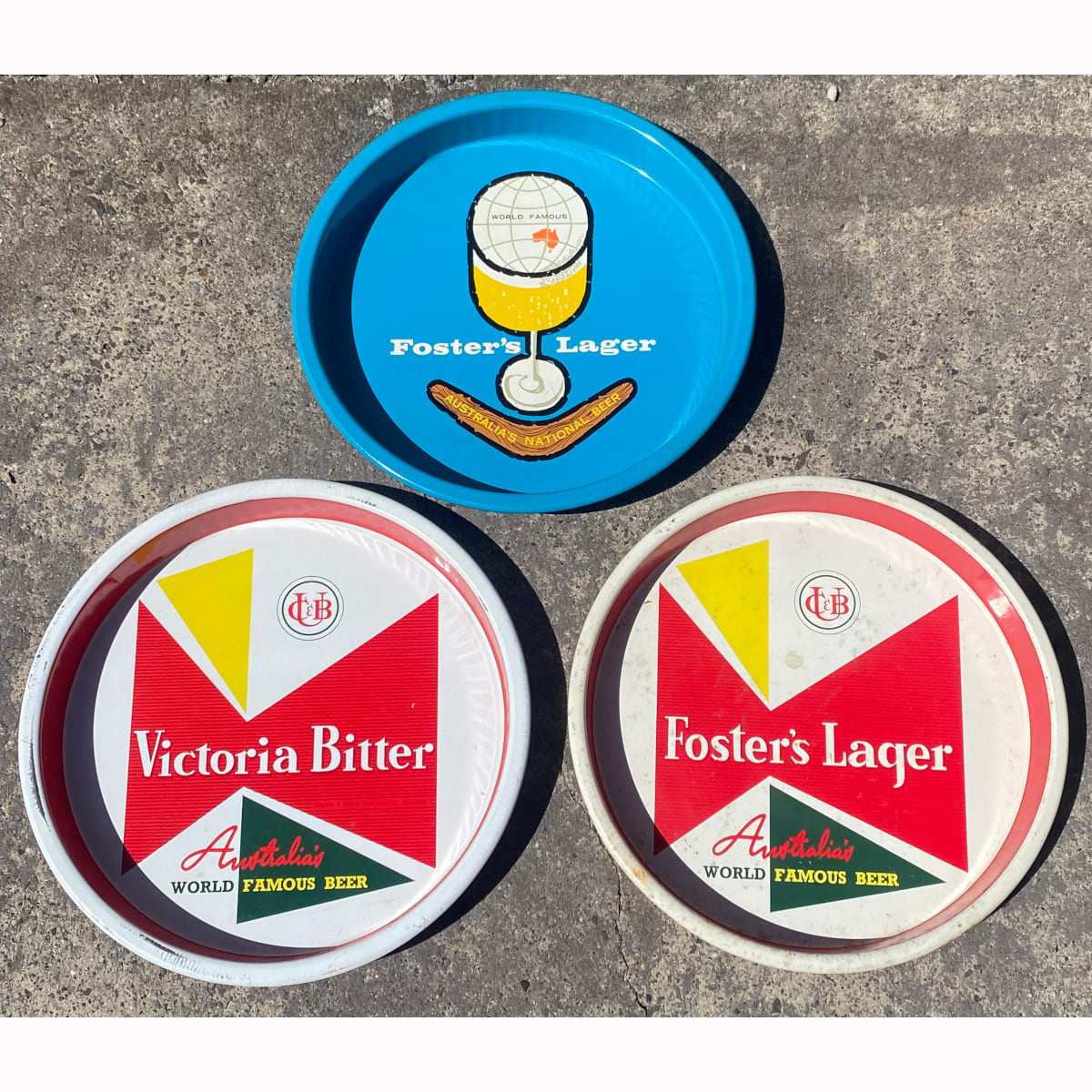 3 Serving Trays. Carlton & United Breweries Ltd. Victoria Bitter and 2 different Foster's Lager. (Victoria)