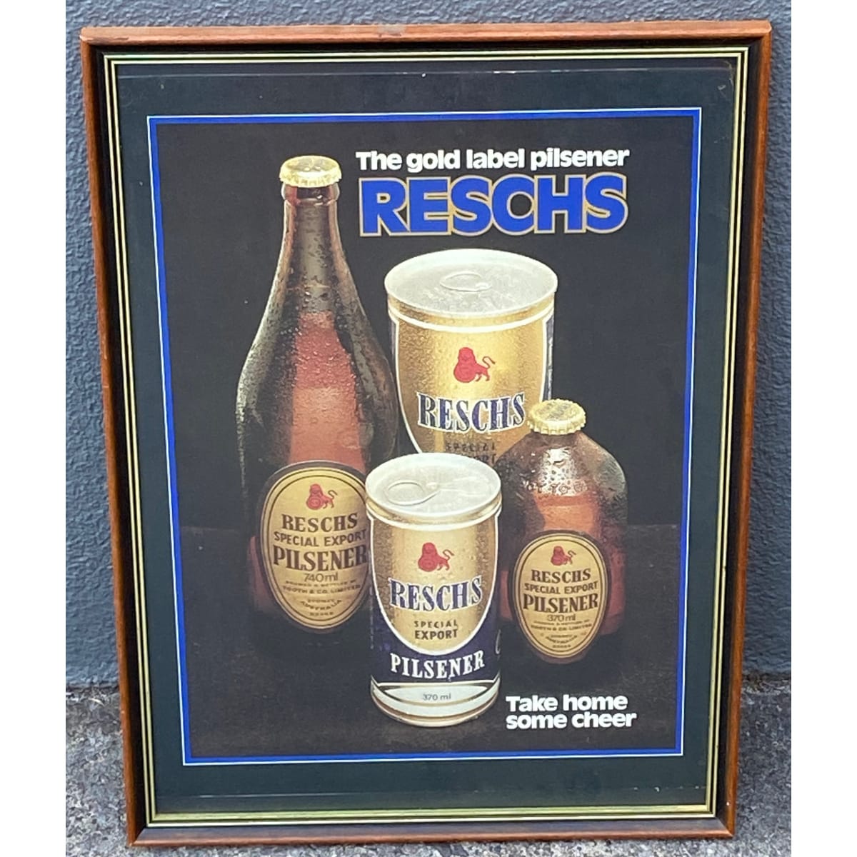 Framed paper advertising. The Gold Label Pilsener, Reschs,. Take Home some cheer. Images of Cans, Bottle & Stubby. (Not for post. Arrangements will have to be made by winning bidder for pickup or courier delivery)