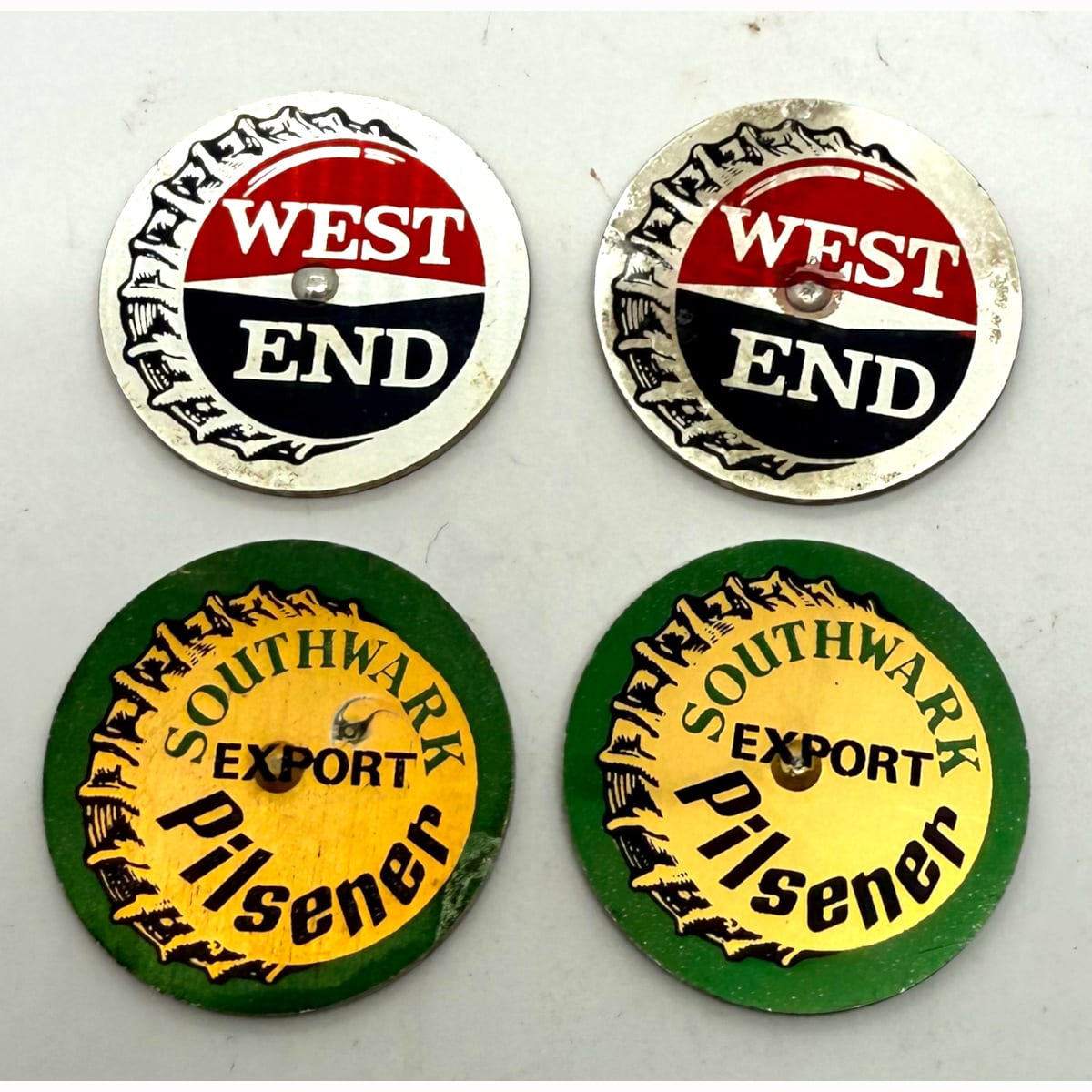 4 advertising spinning tops. "You Pay" for the West End or Pilsener. Southwark Pilsener or West End. (South Australia)