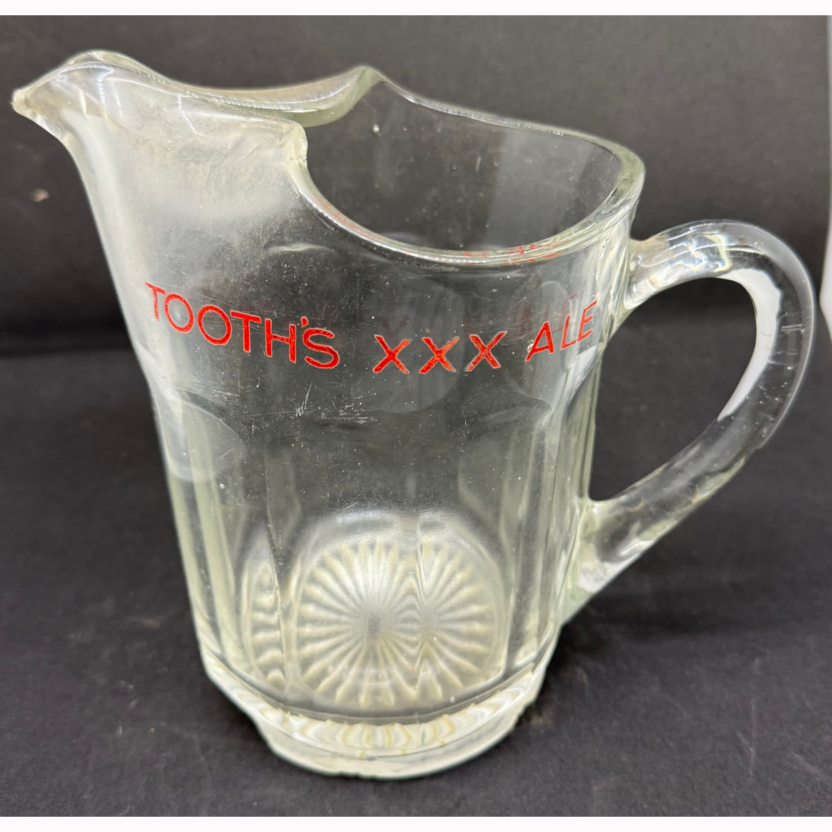 Glass Beer Jug. Red Ceramic Label Print: Tooth's XXX Ale. (Sydney, New South Wales)