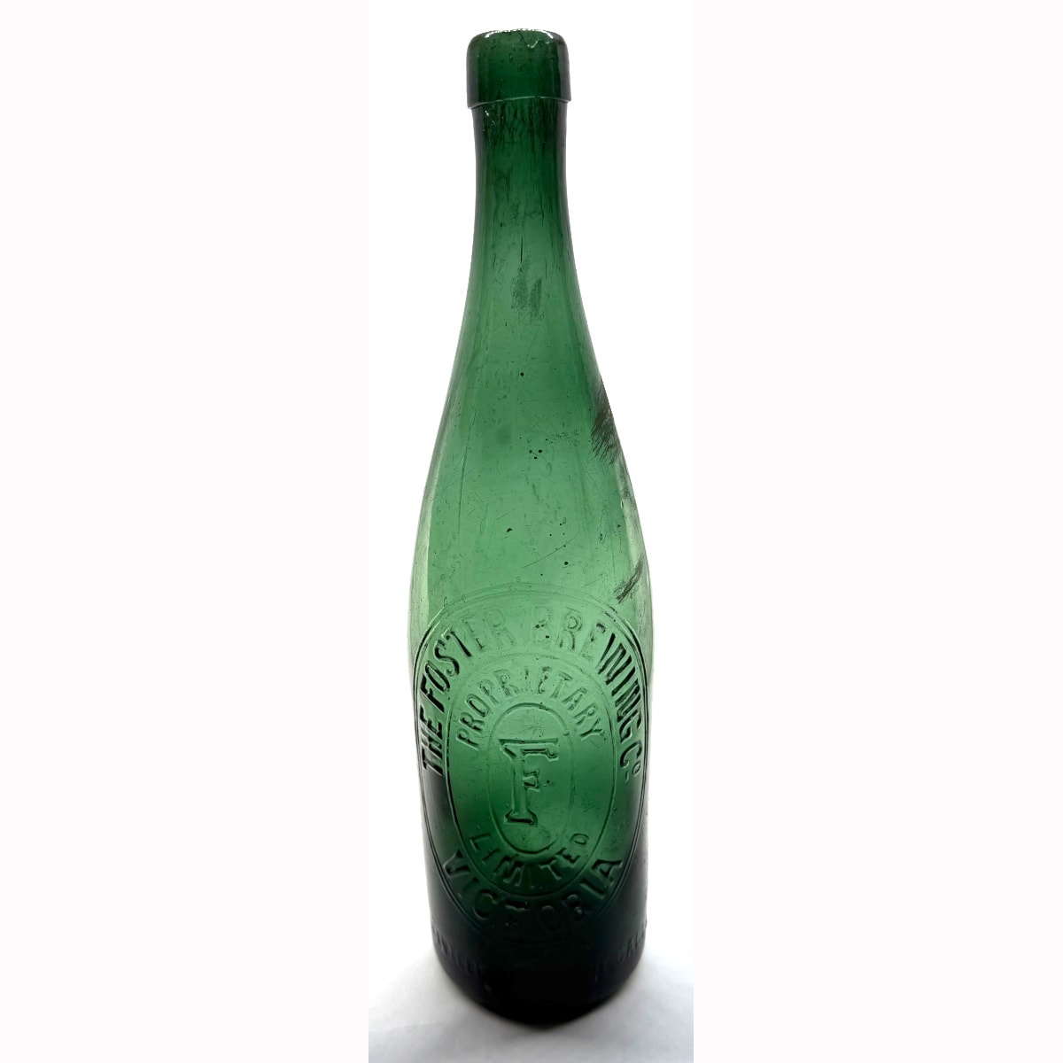 Beer. The Foster Brewing Co Pty Ltd. Fosters Lager. Fosters Beer. Mid Green. 26 oz. (Victoria)