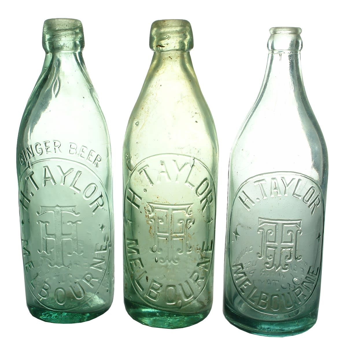 Aerated Waters. Three H. Taylor, Melbourne bottles: 1. Blob Top internal thread, Ginger Beer. Aqua. 26 oz. 2. Blob top internal thread. Aqua. 26 oz. 3. Machine made crown seal. Aqua. 24 oz. (Victoria)