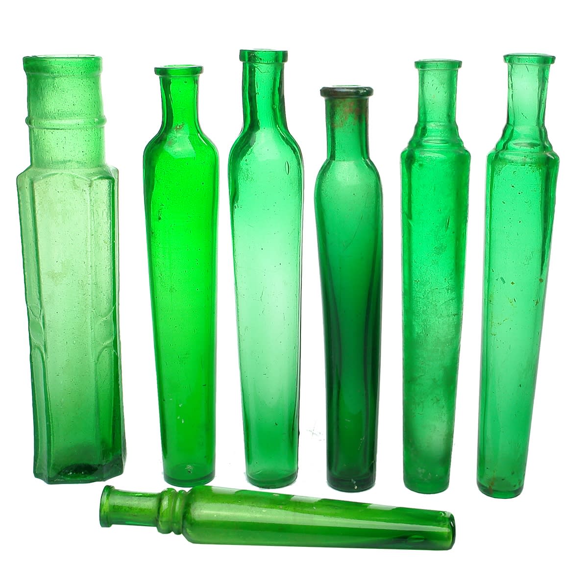 Perfume. 7 green bottles: 1 x Emerald Green Capers Bottle; 6 x Emerald Green Lavendar Water Bottles.