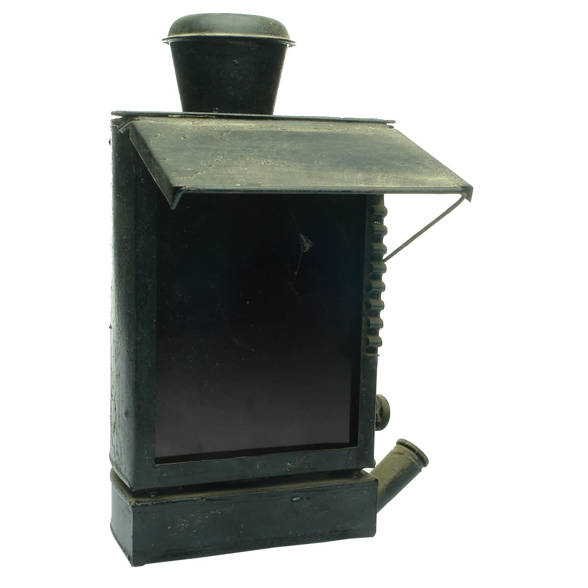 Lamp. Unusual tin oil lamp or similar with red glass, adjustable cover and tin chimney.