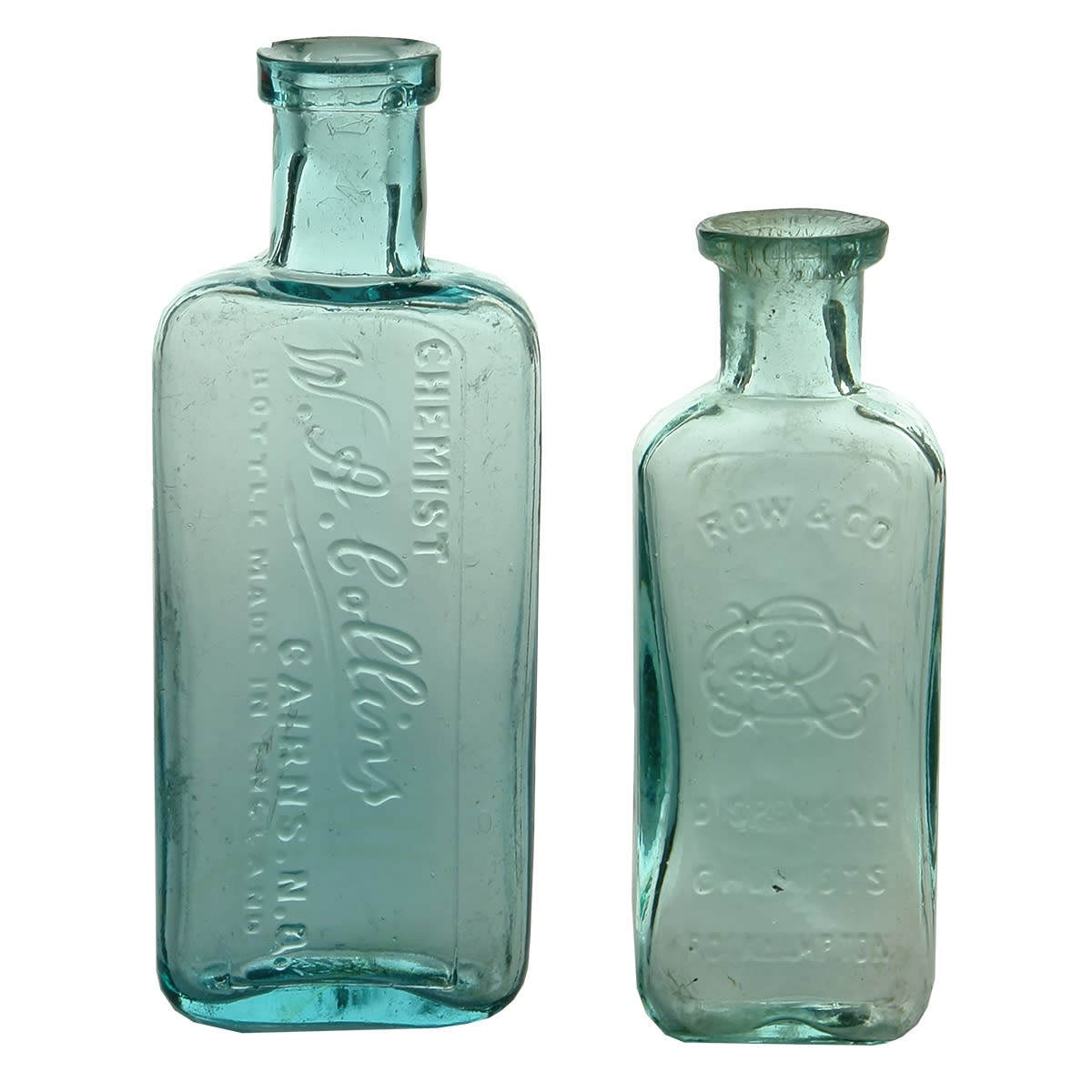 2 Chemists. 1. W. A. Colins, Cairns. Maws base mark. Aqua. 1.5 oz. 109 mm. 2. Row & Co. Rockhampton. Monogram. Aqua. 1 oz. 93 mm. (Queensland)