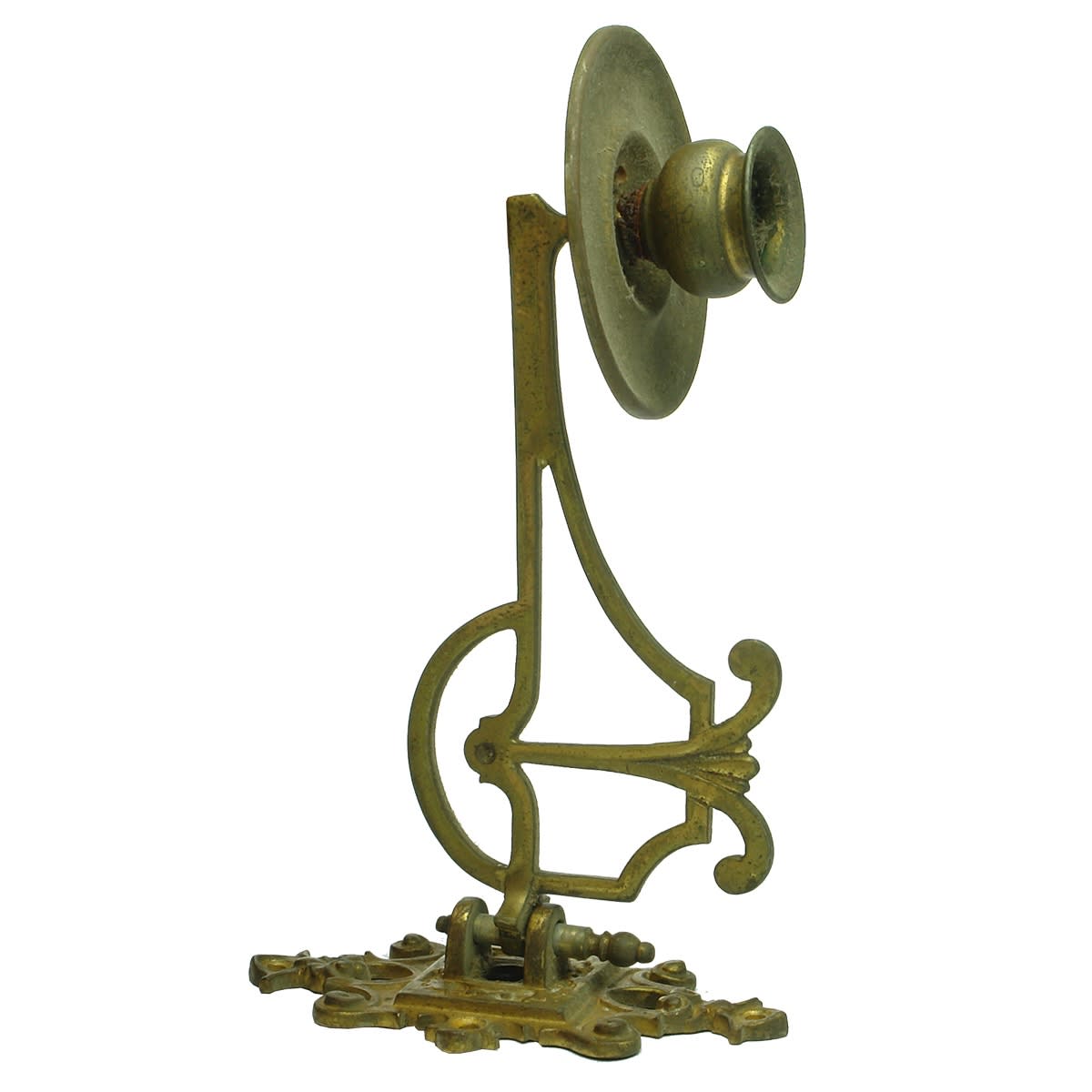 Metalware. Pair of ornate brass wall mounted hinged candle holders.