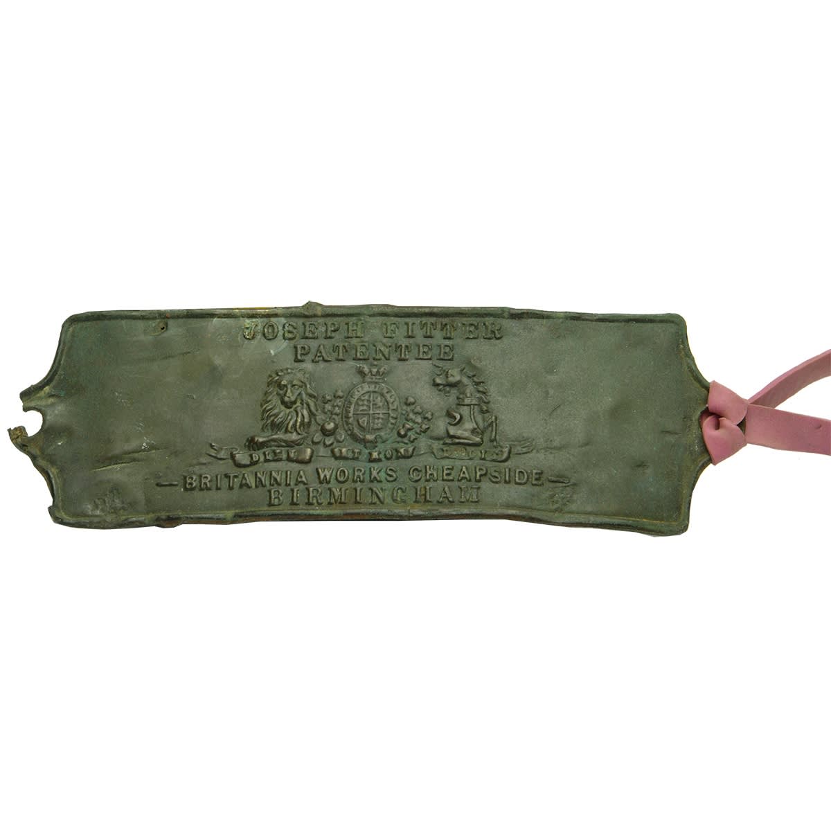 Metalware. Joseph Fitter Patentee, Britannia Works Cheapside, Birmingham. Brass badge. (United Kingdom)