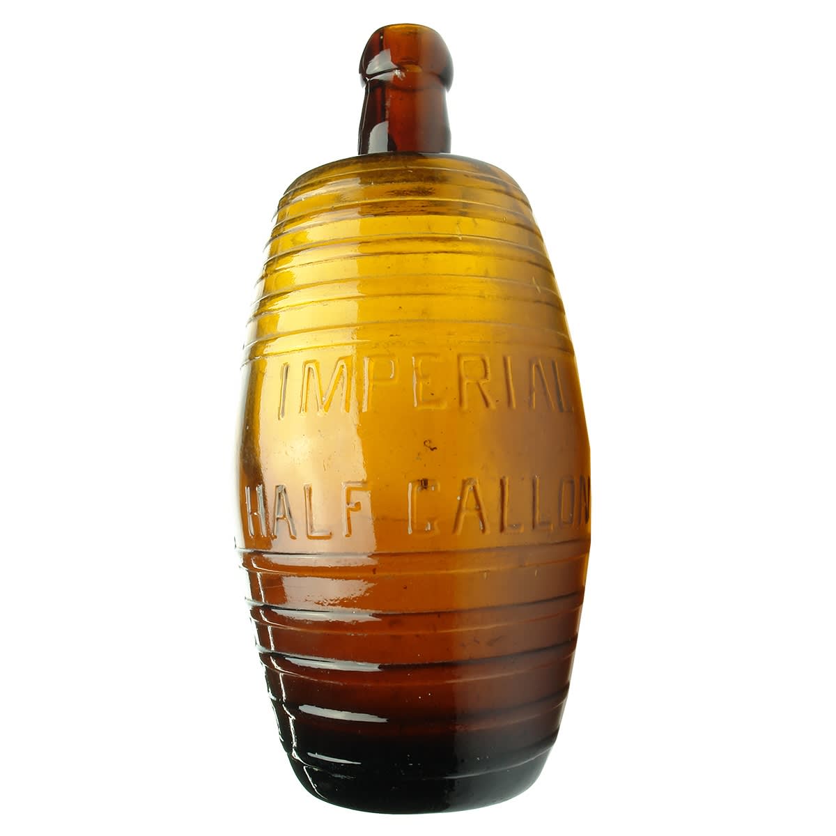 3 Imperial Half Gallon Barrel shaped bottles: Unbranded early amber; Loy Bros amber; Unbranded later Clear.
