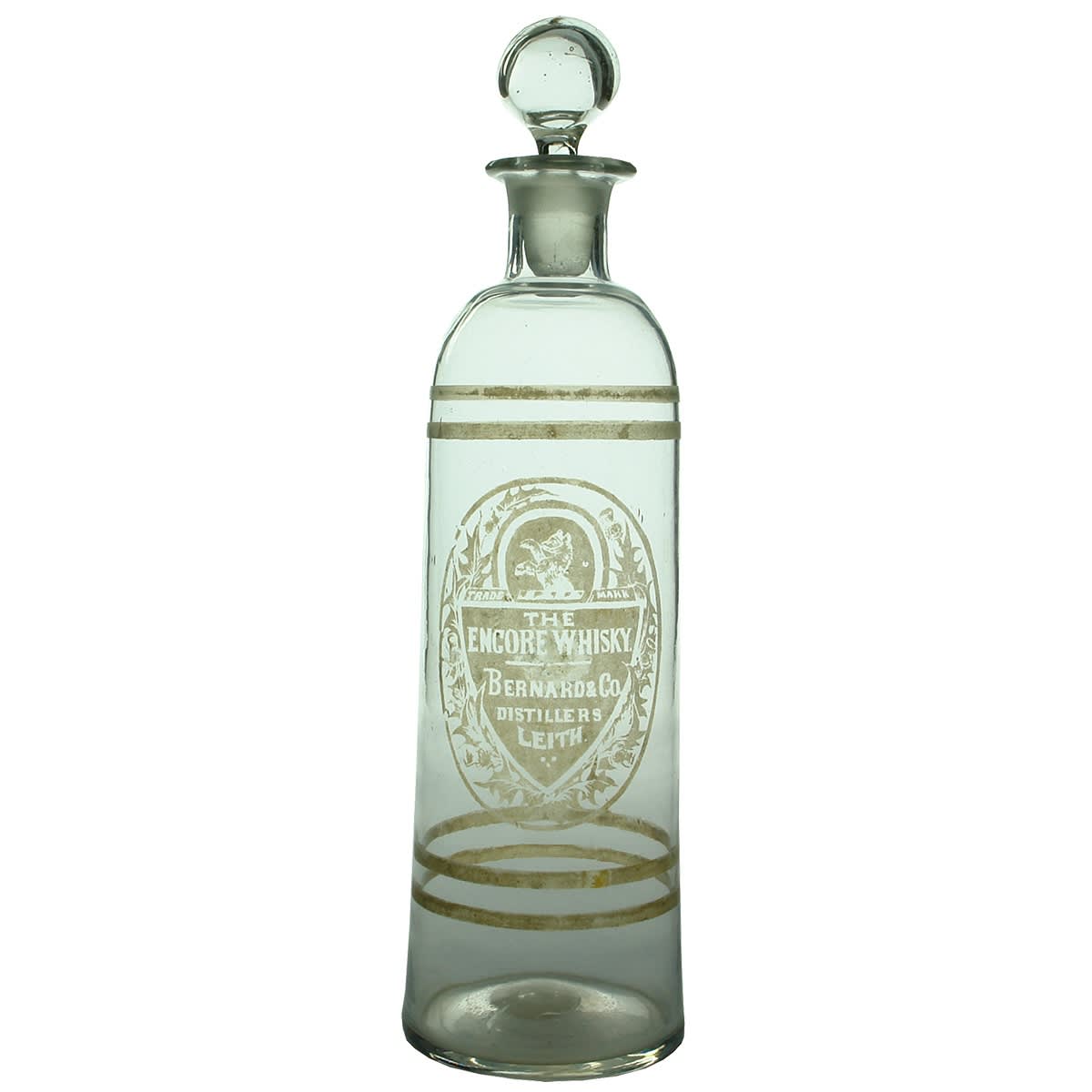 Decanter. The Encore Whisky, Bernard & Co Distillers Leith. Etched. With a fitting stopper. Ground pontil scar to base.