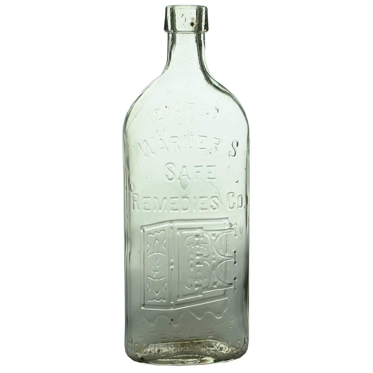 Cure. Warners Safe Cure. Warner's Safe Remedies Co. Rochester. Clear. 12.5 oz.