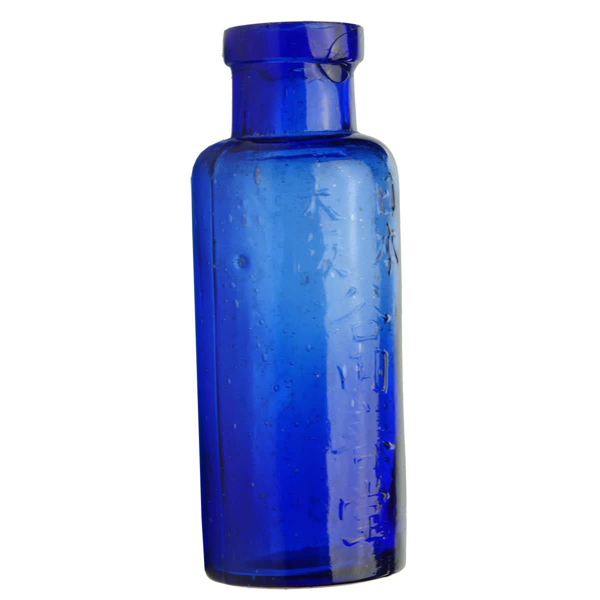 Poison. Well maybe? Columns of Chinese or Japanese characters down the front and back. Small wide mouth cylinder. 1.5 oz. 82 mm.