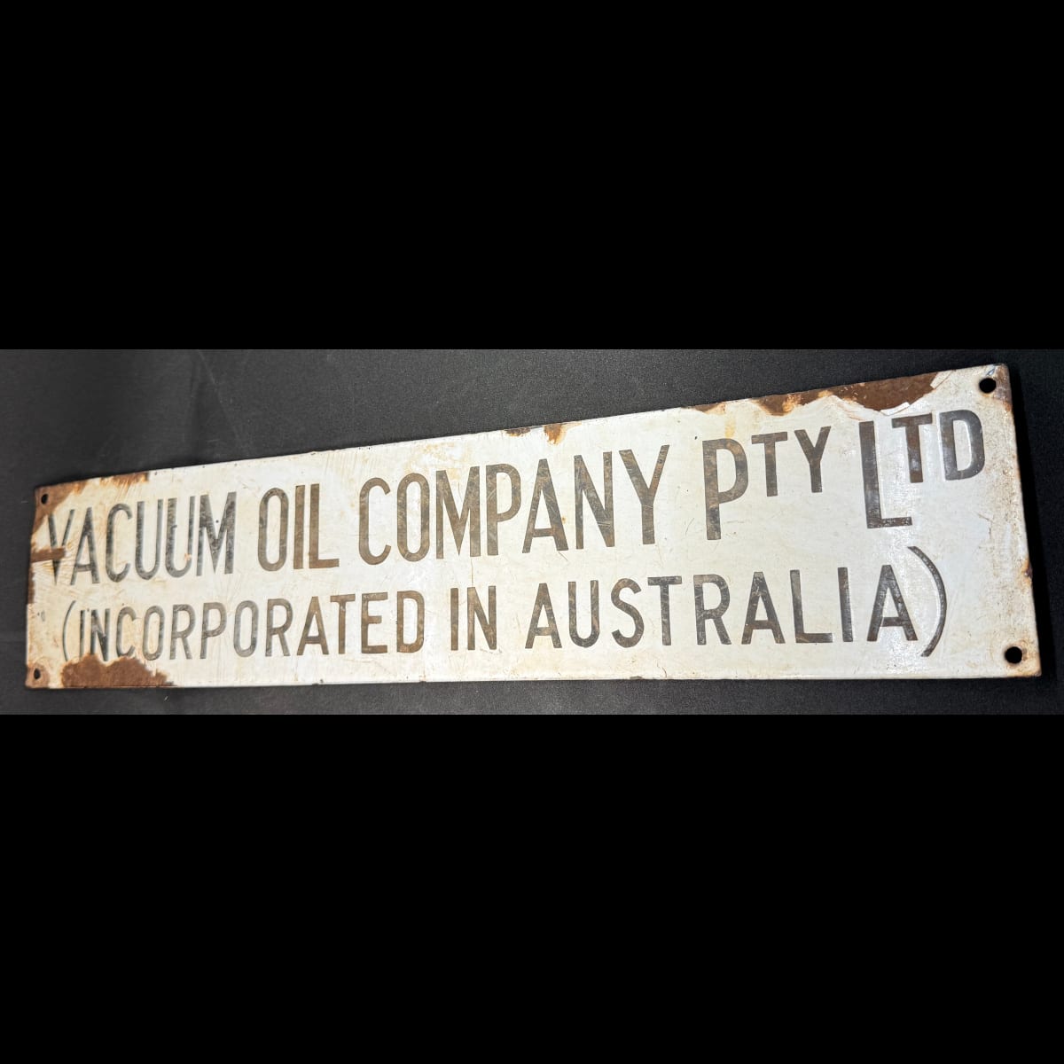 Enamel Sign. Vacuum Oil Company Pty Ltd. Incorporated in Australia. Black & White.