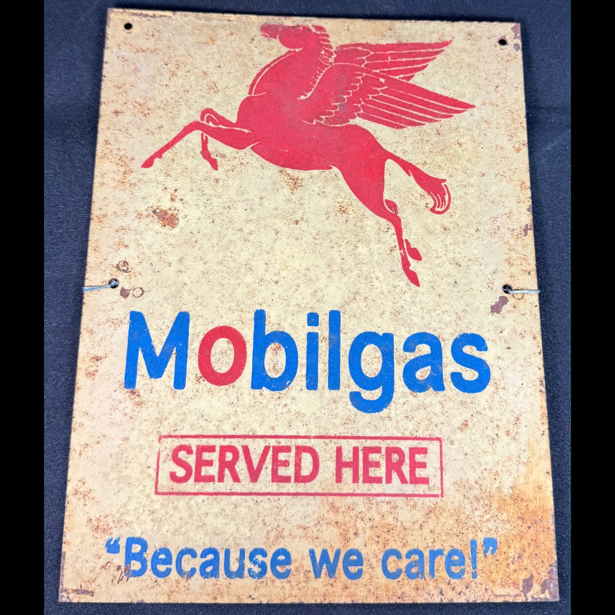 Reproduction Sign. Mobilgas Served Here Because we care. Small printed sign.