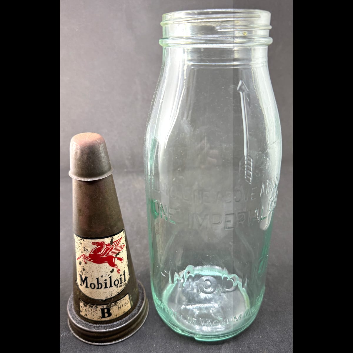 Quart Oil bottle & Tin Pourer. Mobiloil. Vacuum Oil Co Pty Ltd. SAE B No 60. Pegasus facing left on top.