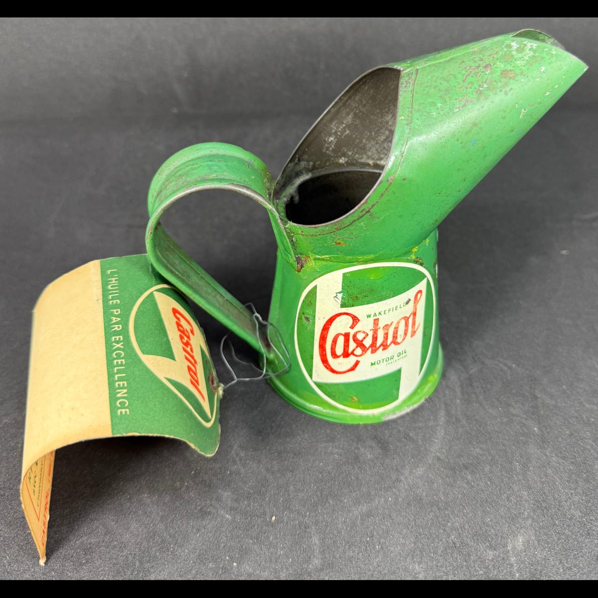 Tin Pouring Jug & Measure. Castrol Wakefield Motor Oil. Gill, 1/4 Pint. With French tag attached.