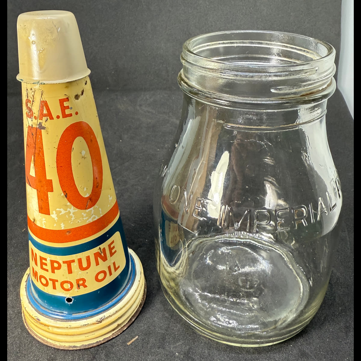 Tin oil top pourer. Neptune Motor Oil. SAE 40. Generic Pint Bottle.