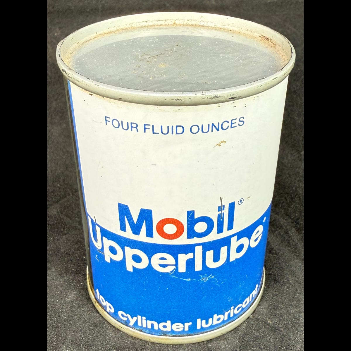 Small tin. Mobil Upperlube. 4 oz. Top Cylinder Lubricant. Mobil Oil Corporation New York.