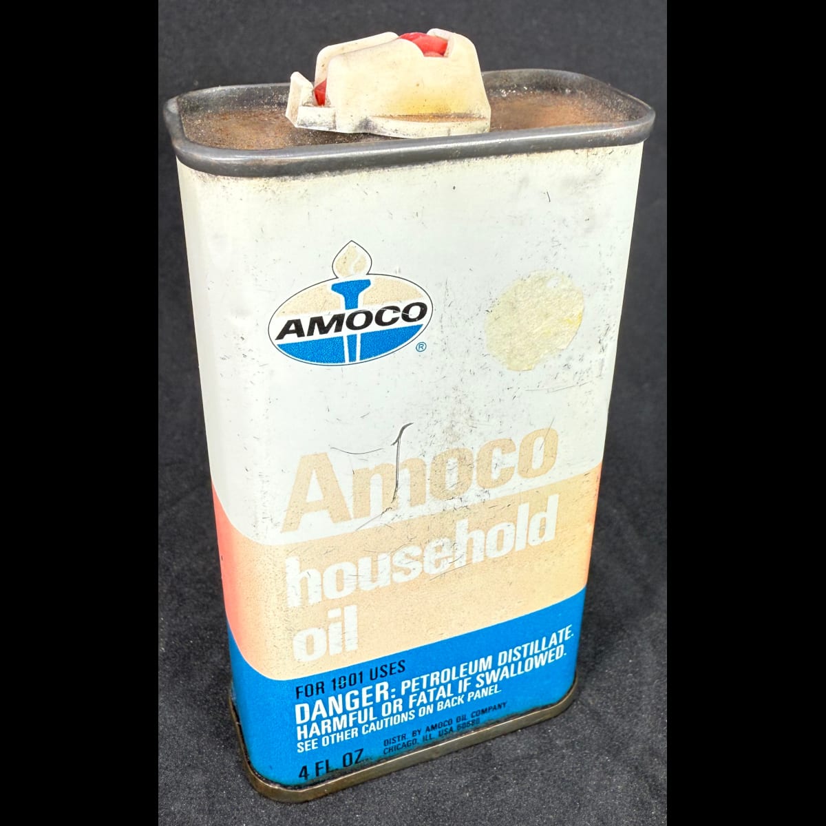 Household Oil Tin. Oiler. Amoco Household Oil. 4 oz. Child Resistant Spout. (Not for standard post due to contents. Winning bidder will have to make other arrangements to collect)