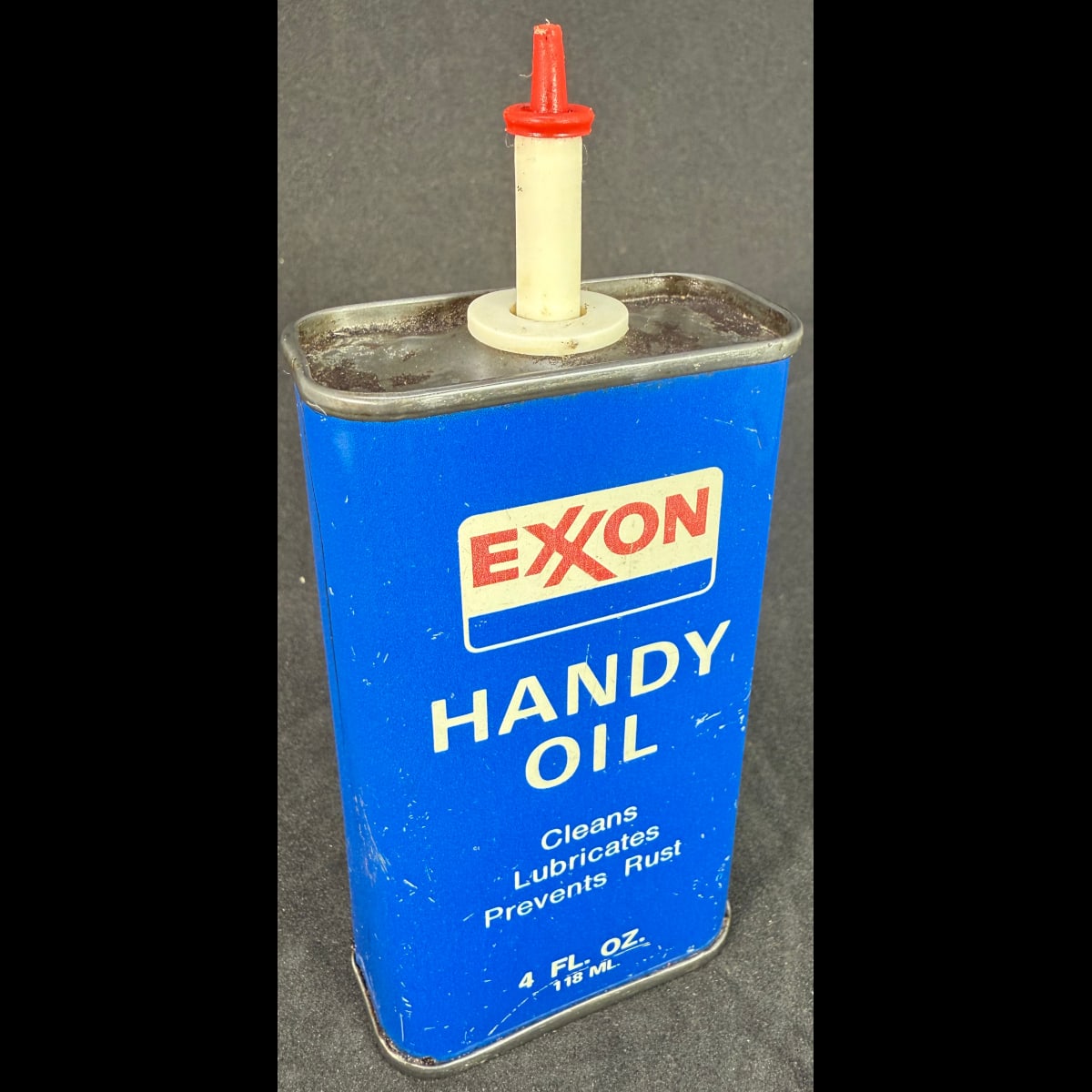 Household Oil tin. Exxon Handy Oil. 4 oz. Exxon Company USA. (Not for standard post due to contents. Winning bidder will have to make other arrangements to collect)