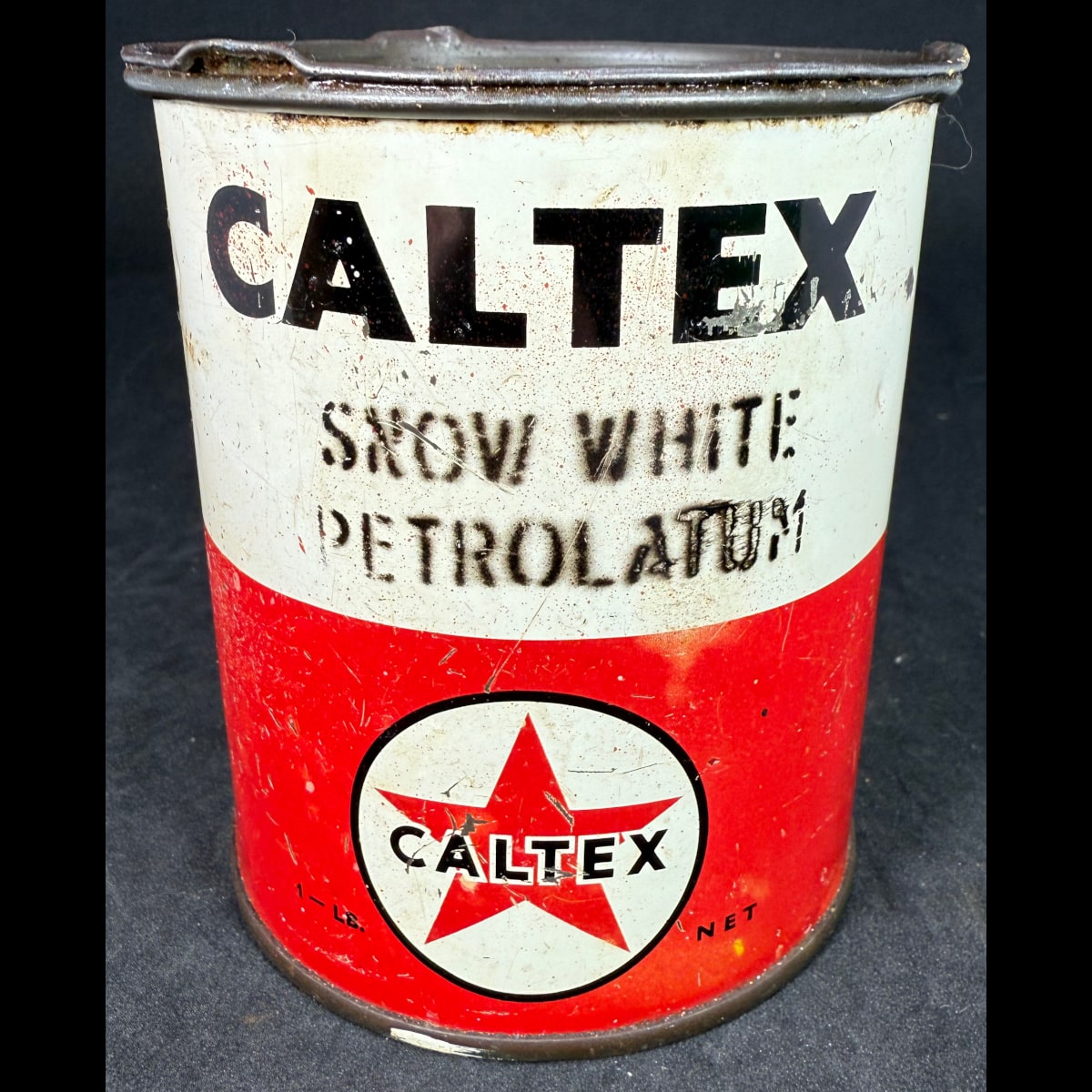 Tin. Caltex Snow White Petrolatum. 1 lb tin. Black on Red & White.