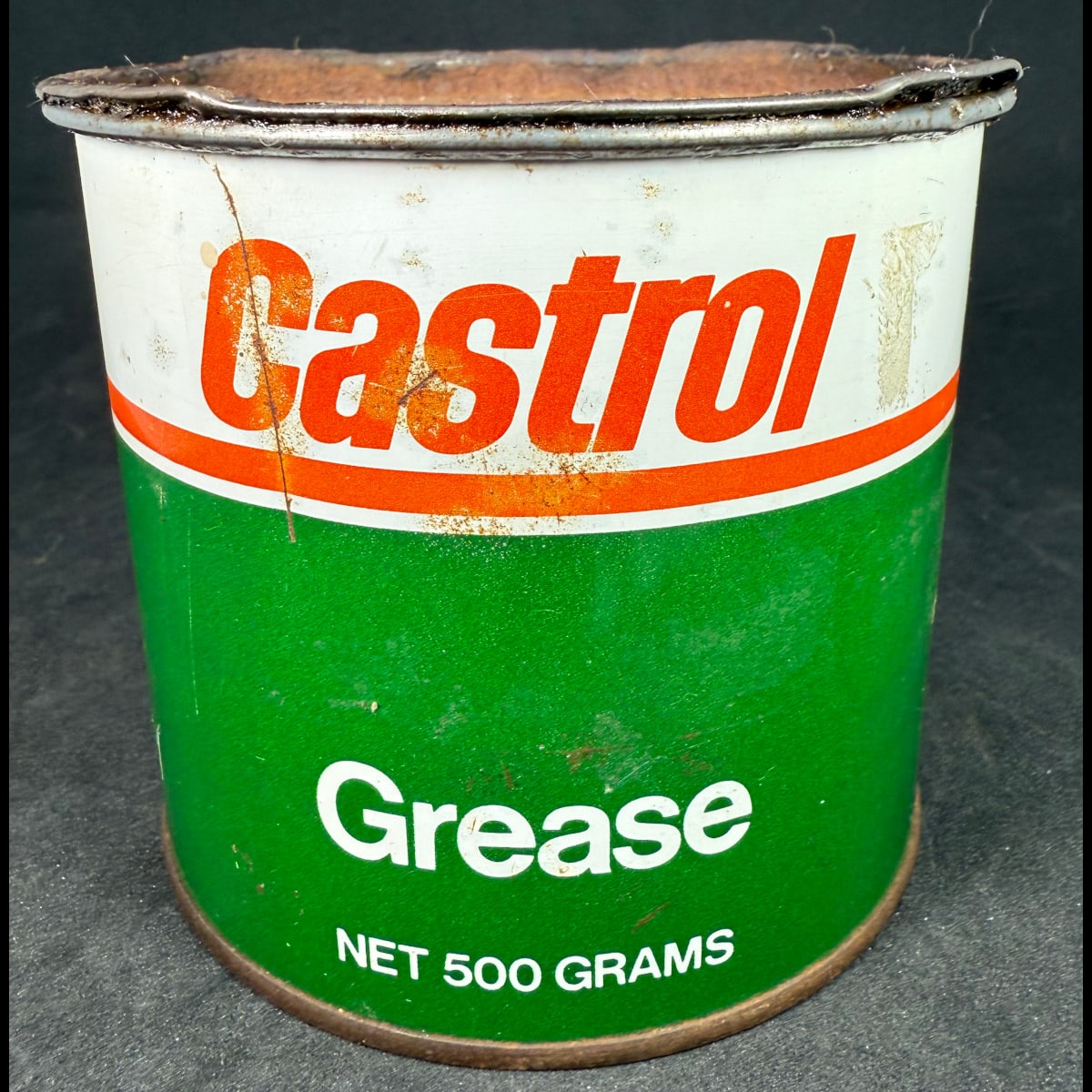 Grease tin. Castrol Grease. Net 500 grams. List of Castrol Automotive greases on the back. (Not for standard post due to contents. Winning bidder will have to make other arrangements to collect)