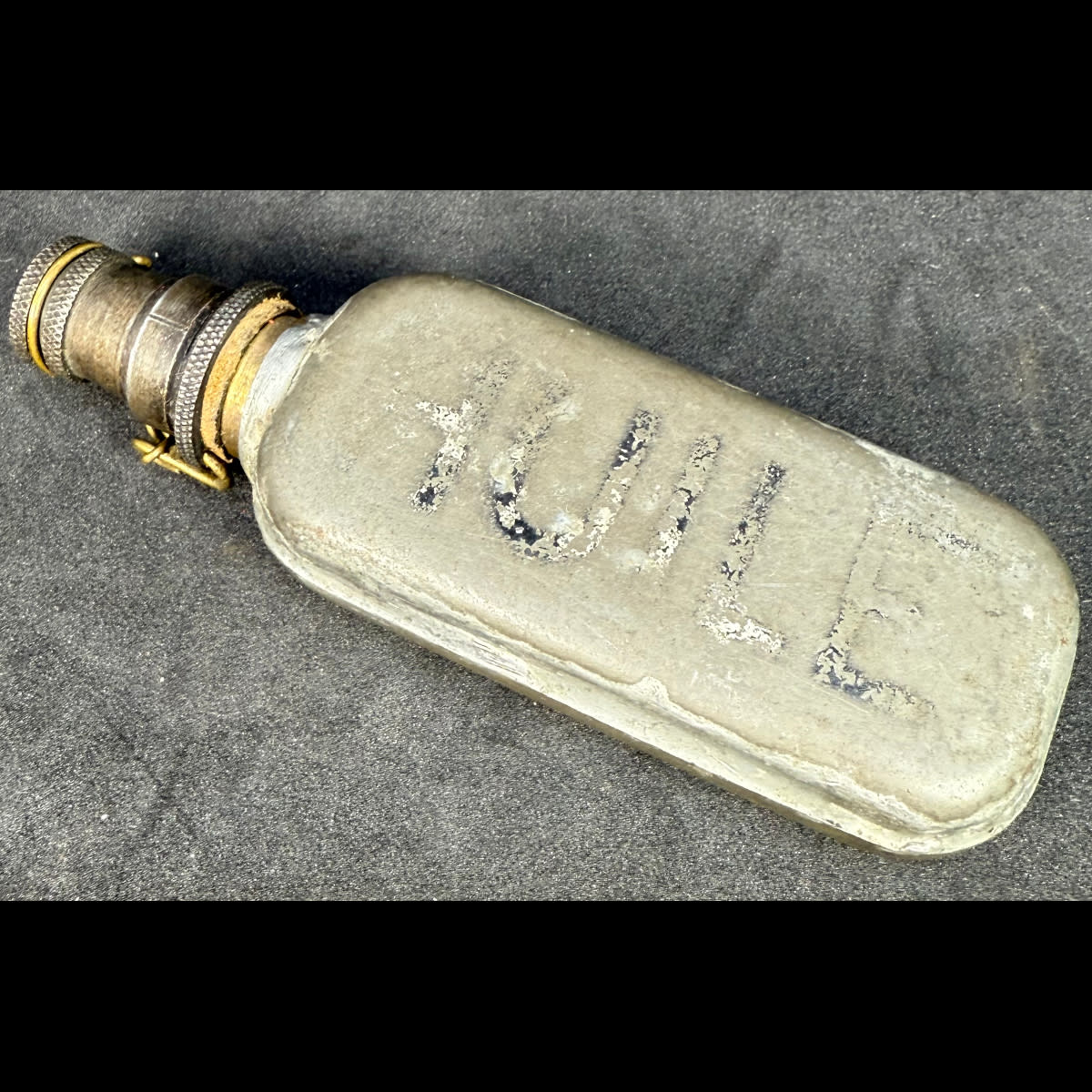 Oiler. French gun oiler with Huile printed on two sides.