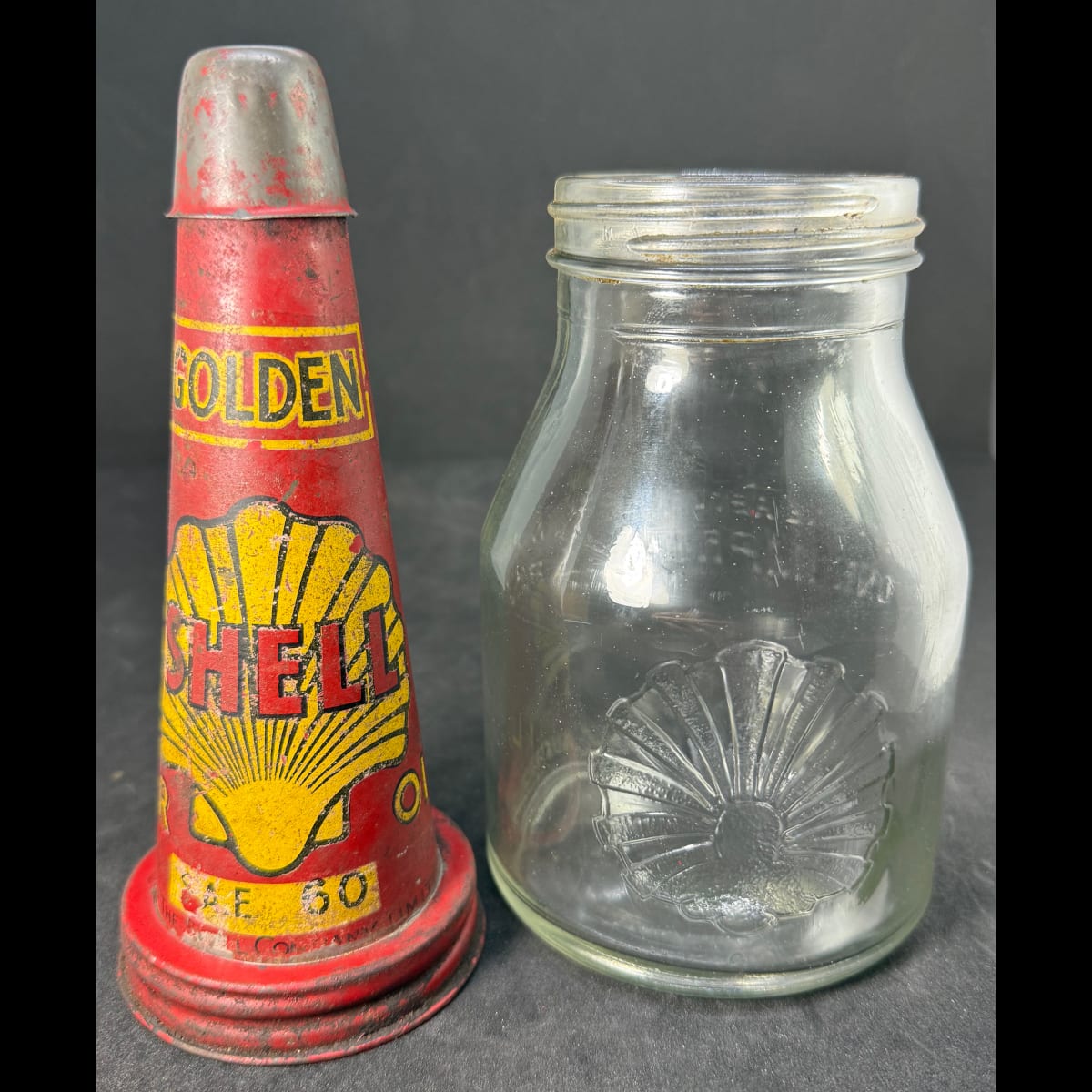 Tin oil top pourer. Shell Golden SAE50. The Shell Company Limited. Pint bottle Shell Company of Australia Ltd. AGM base.