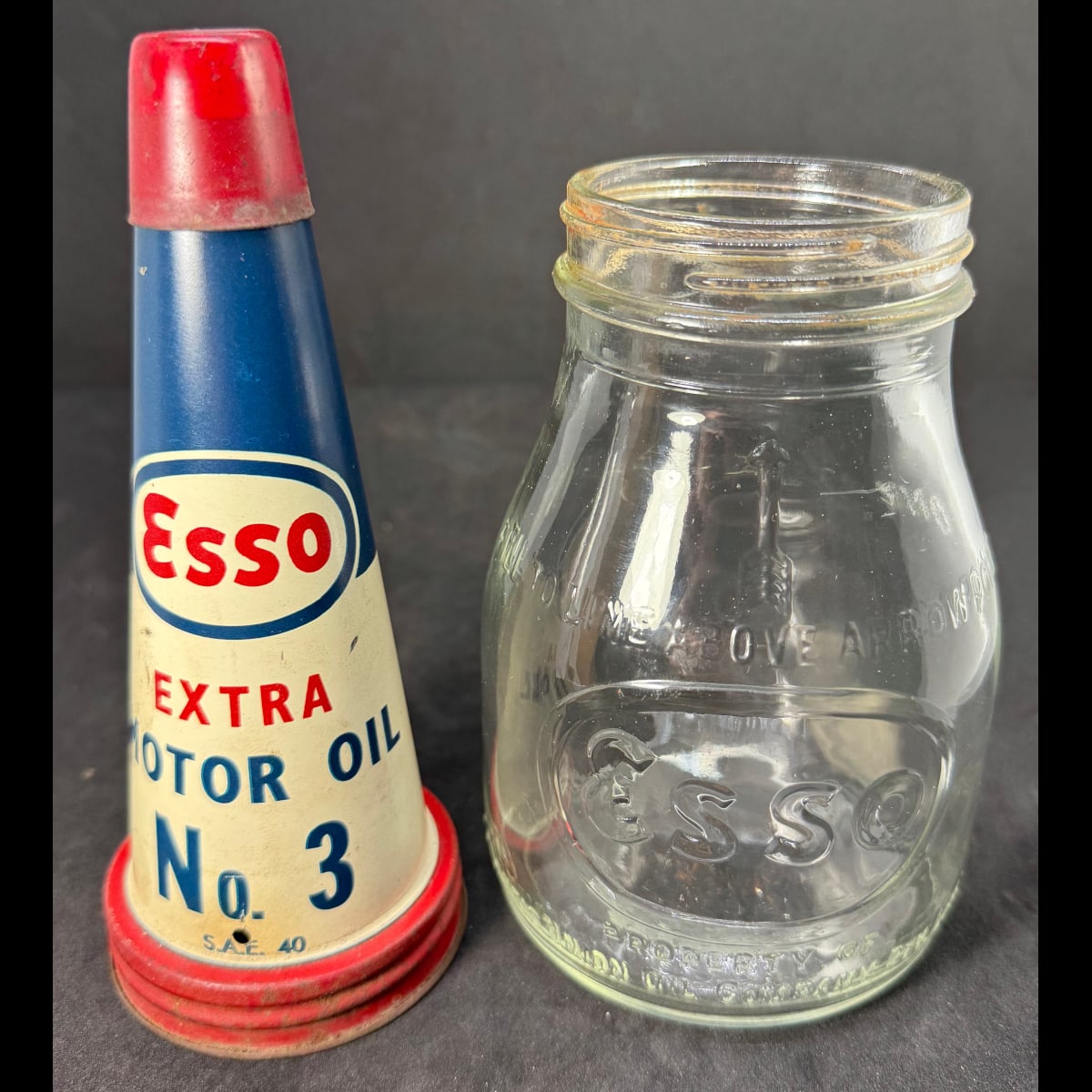 Tin oil top Pourer and embossed bottle. Esso Extra Motor Oil. Atlantic Union Oil Company Pty Ltd. Pint.