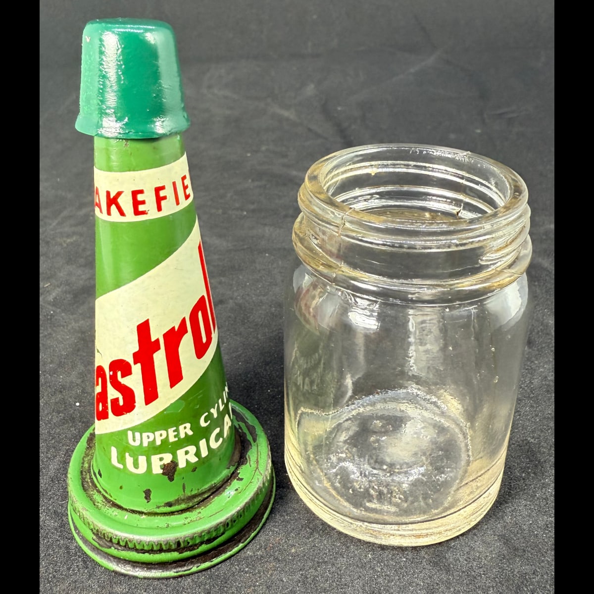 Tin oil top pourer on plain jar. Wakefield Castrollo Upper Cylinder Lubricant. 4 oz.