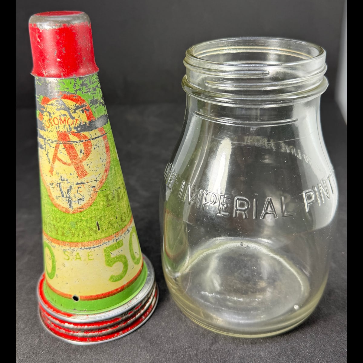 Tin oil top pourer. A. P. Penn. Pennsylvania Oil. SAE 50. Generic Pint bottle.