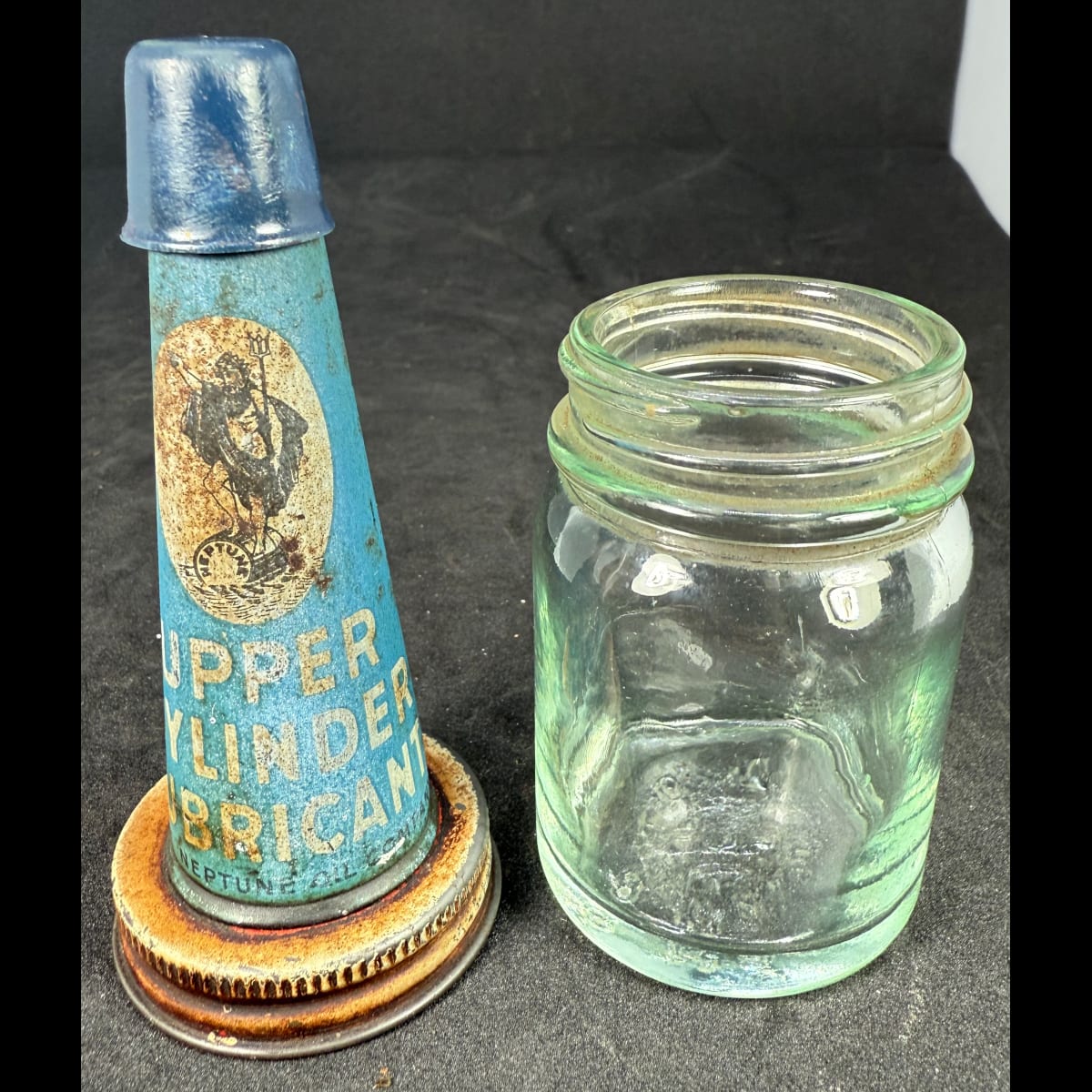 Tin oil top pourer on plain jar. Neptune Upper Cylinder Lubricant. Neptune Oil Company Pty Ltd.