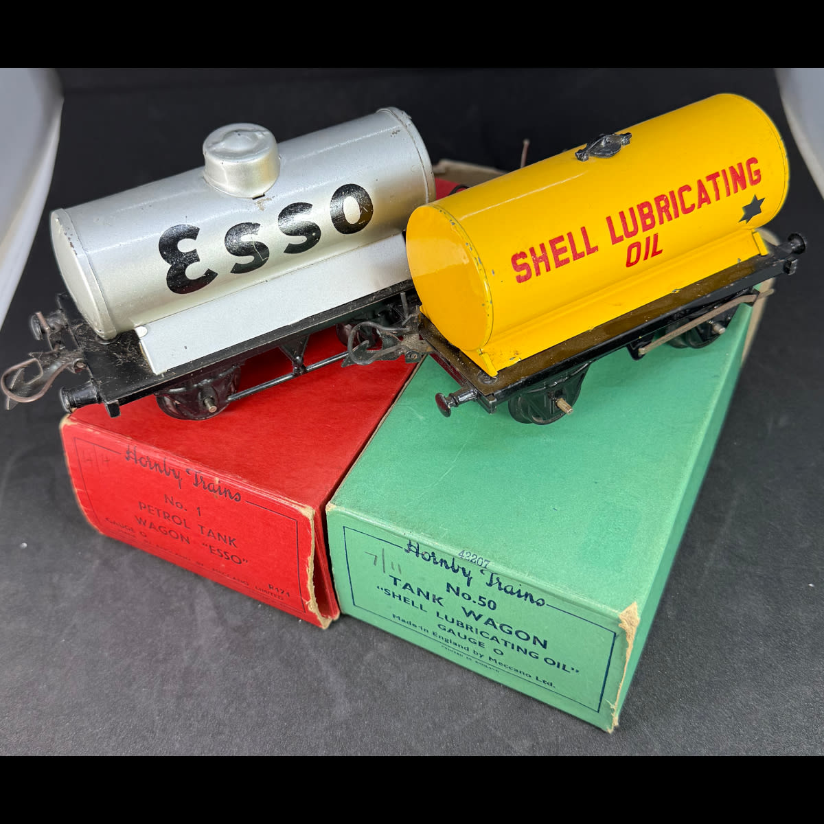 2 Hornby Train Set Tank Wagons: No. 1. Petrol Tank - Esso; No. 50. Tank Wagon - Shell Lubricating Oil. Original boxes. Meccano Ltd.